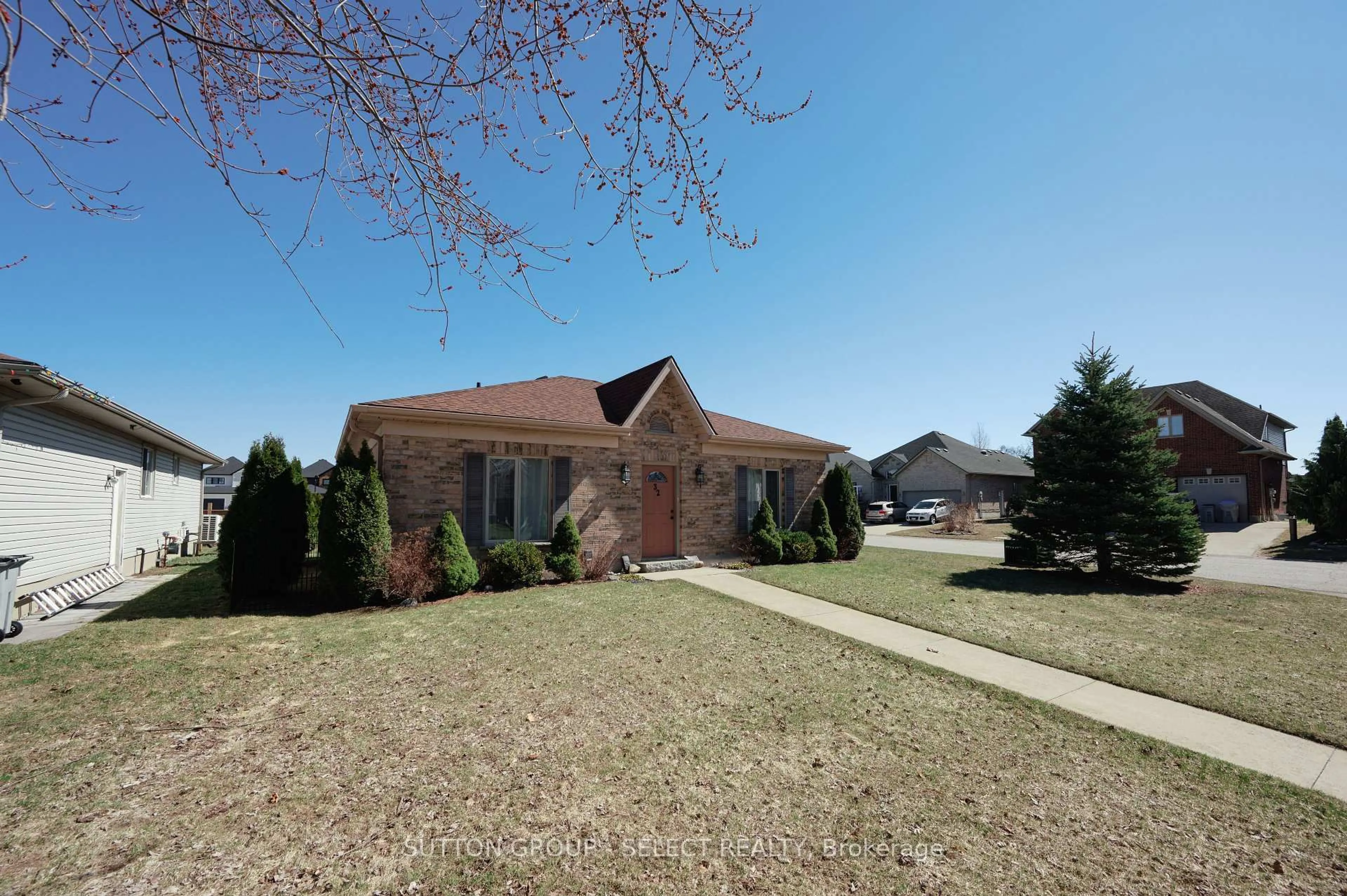 Home with brick exterior material, street for 32 Robin St, North Middlesex Ontario N0M 1A0