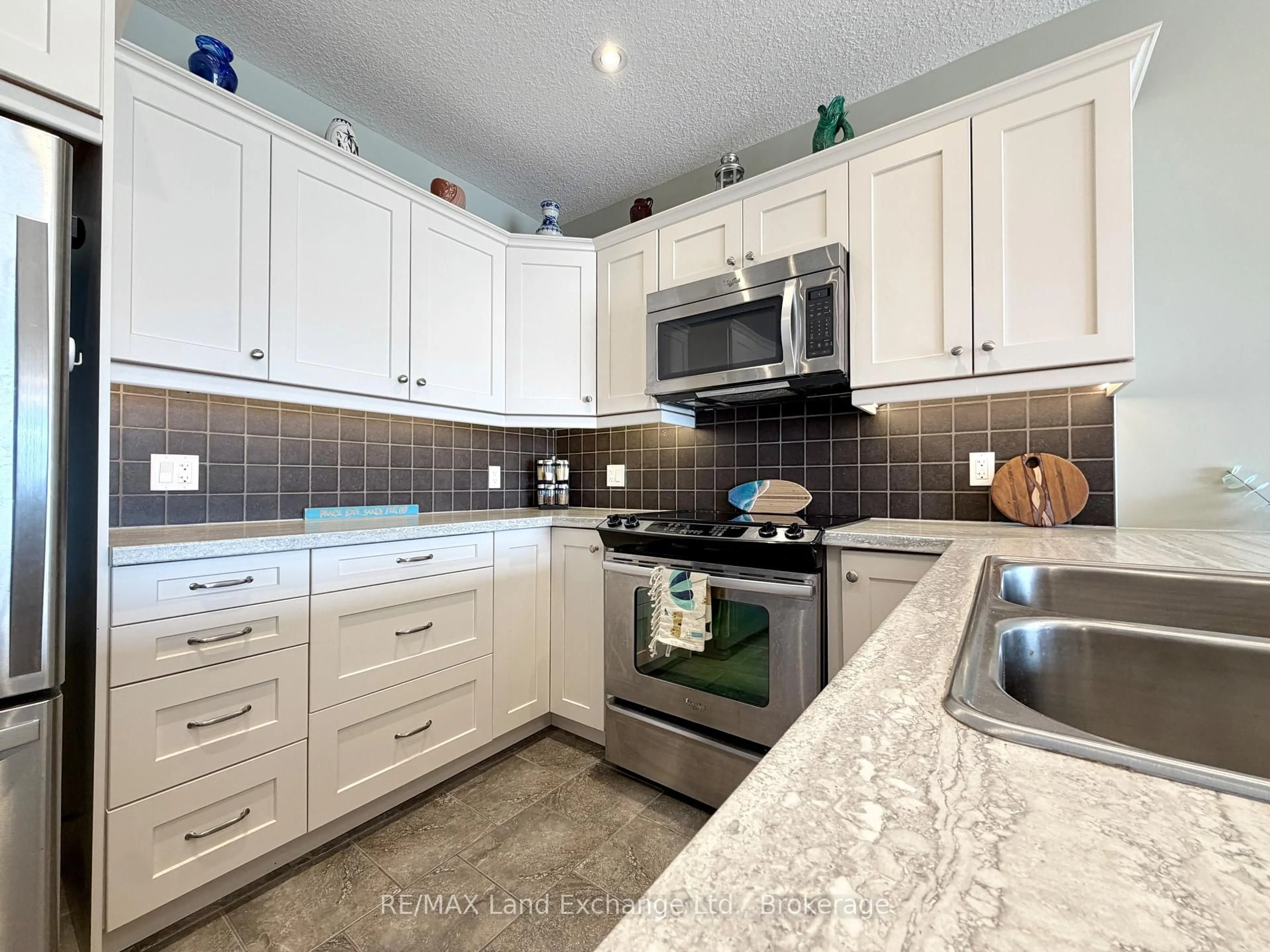 Contemporary kitchen, ceramic/tile floor for 137 ELGIN St #203, Saugeen Shores Ontario N0H 2C6