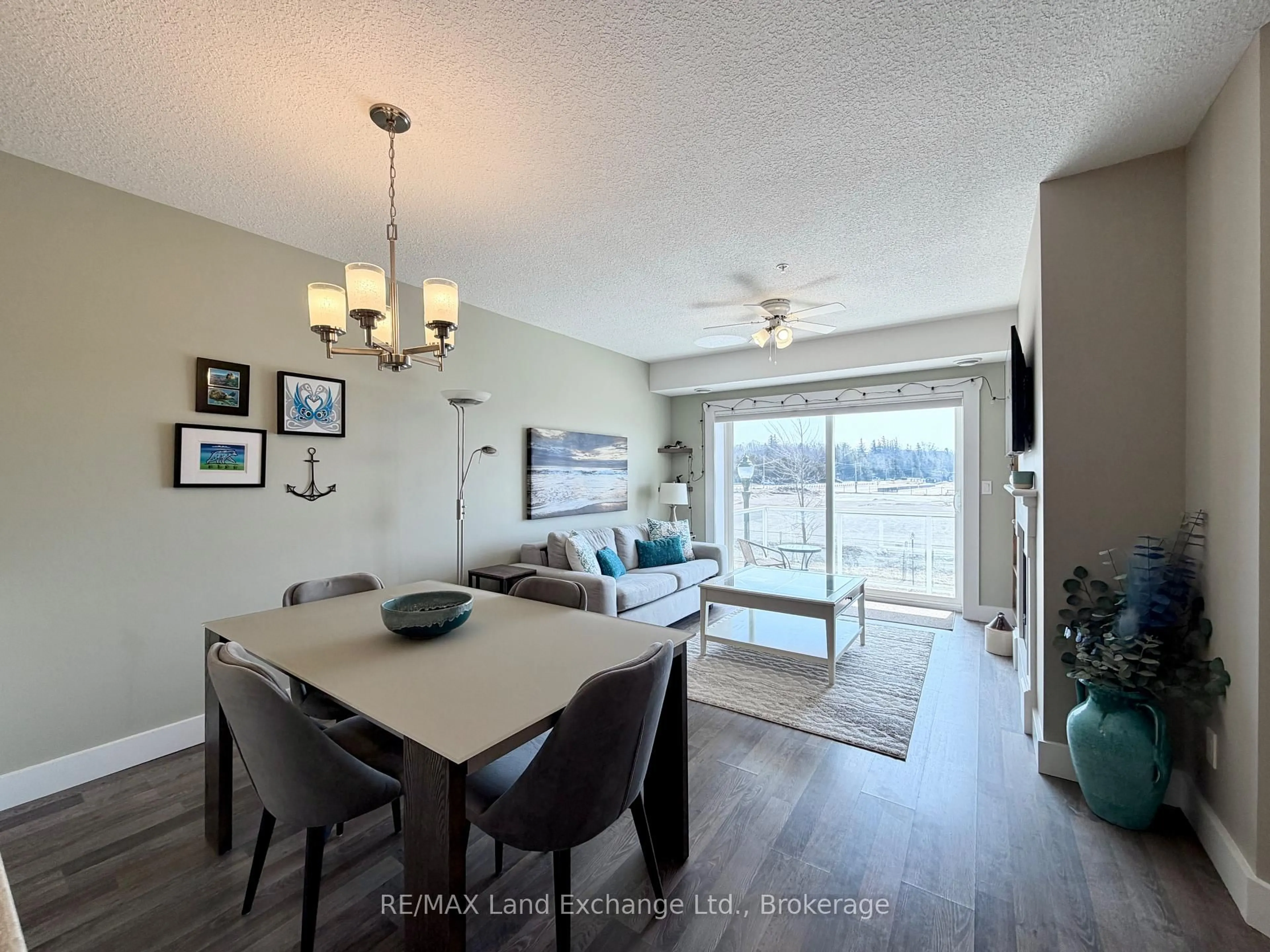 Living room with furniture, wood/laminate floor for 137 ELGIN St #203, Saugeen Shores Ontario N0H 2C6