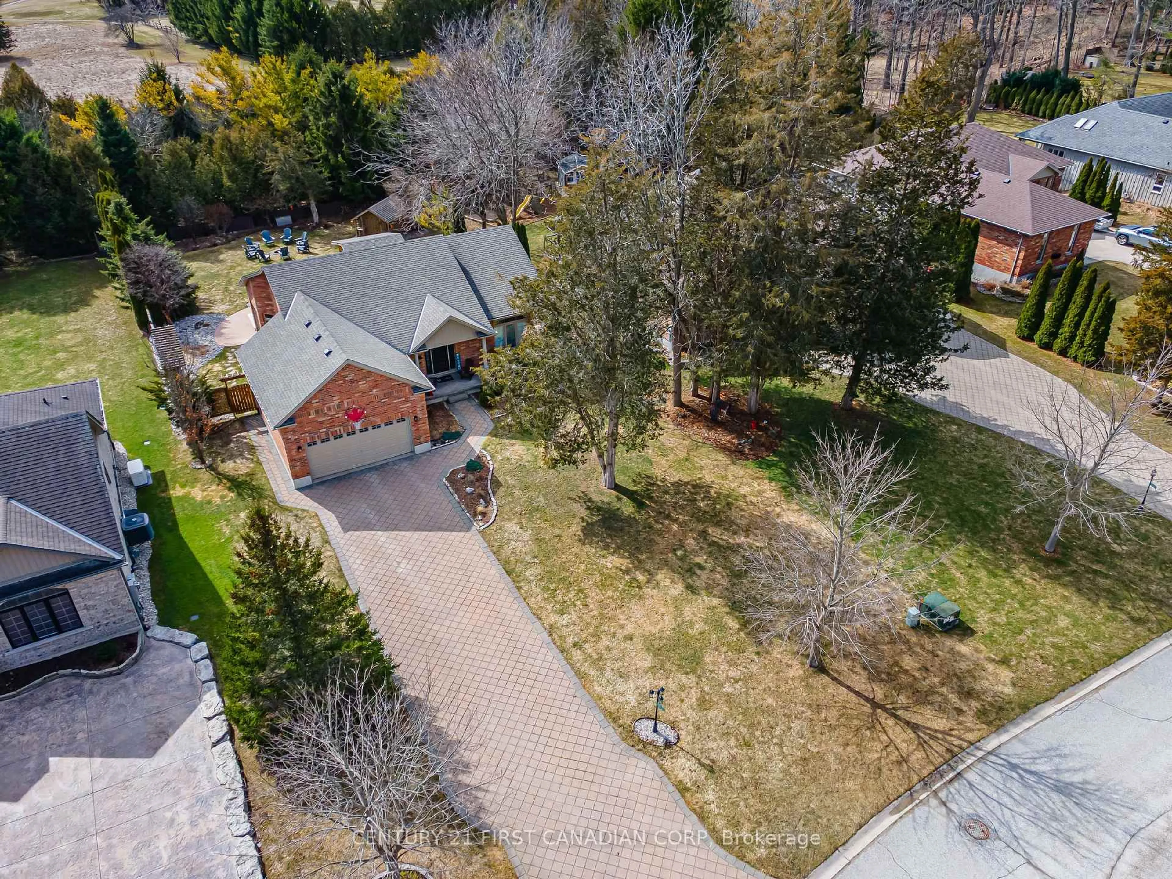 A pic from outside/outdoor area/front of a property/back of a property/a pic from drone, street for 10159 Meadowlilly Cres, Lambton Shores Ontario N0M 1T0