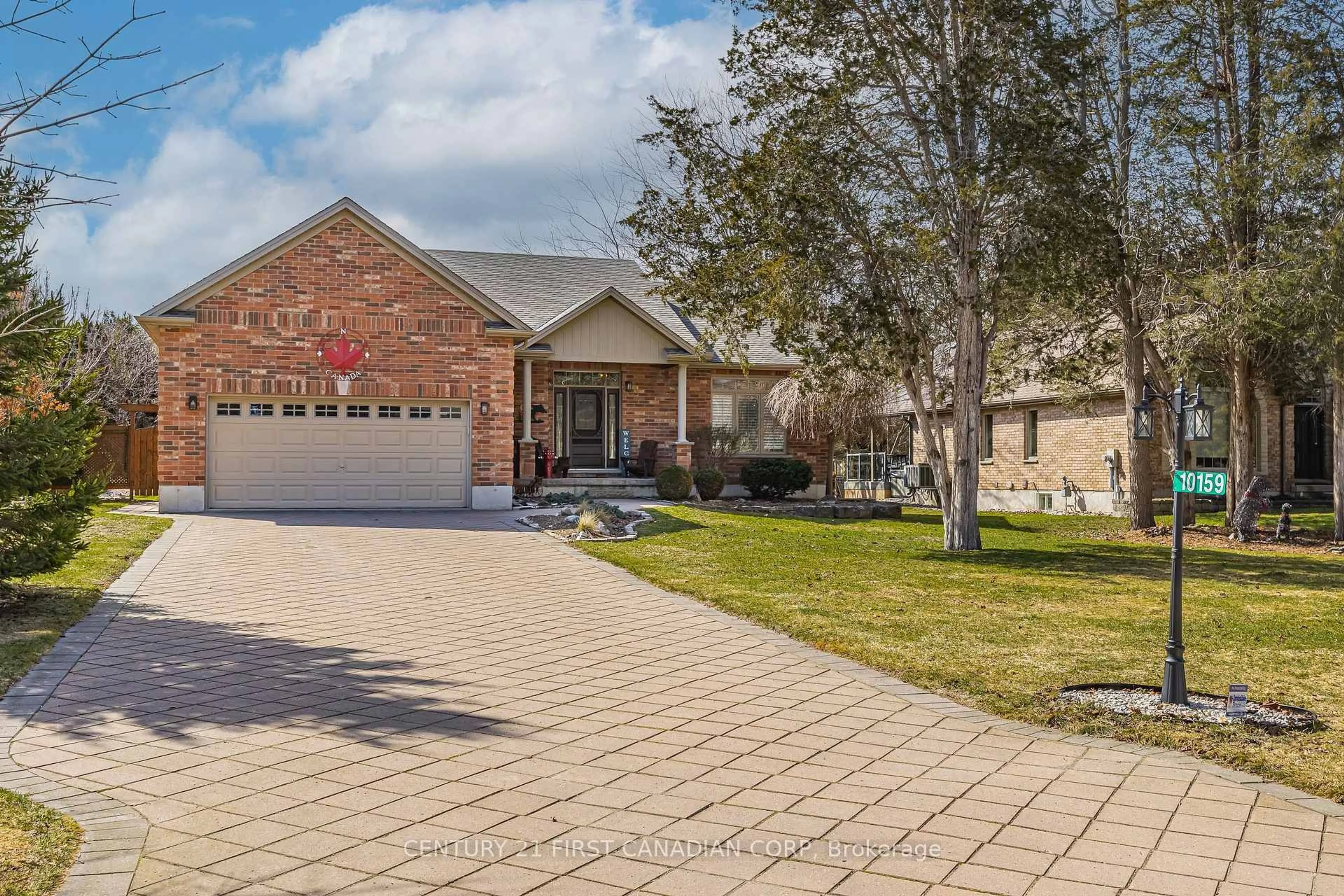 Home with brick exterior material, street for 10159 Meadowlilly Cres, Lambton Shores Ontario N0M 1T0