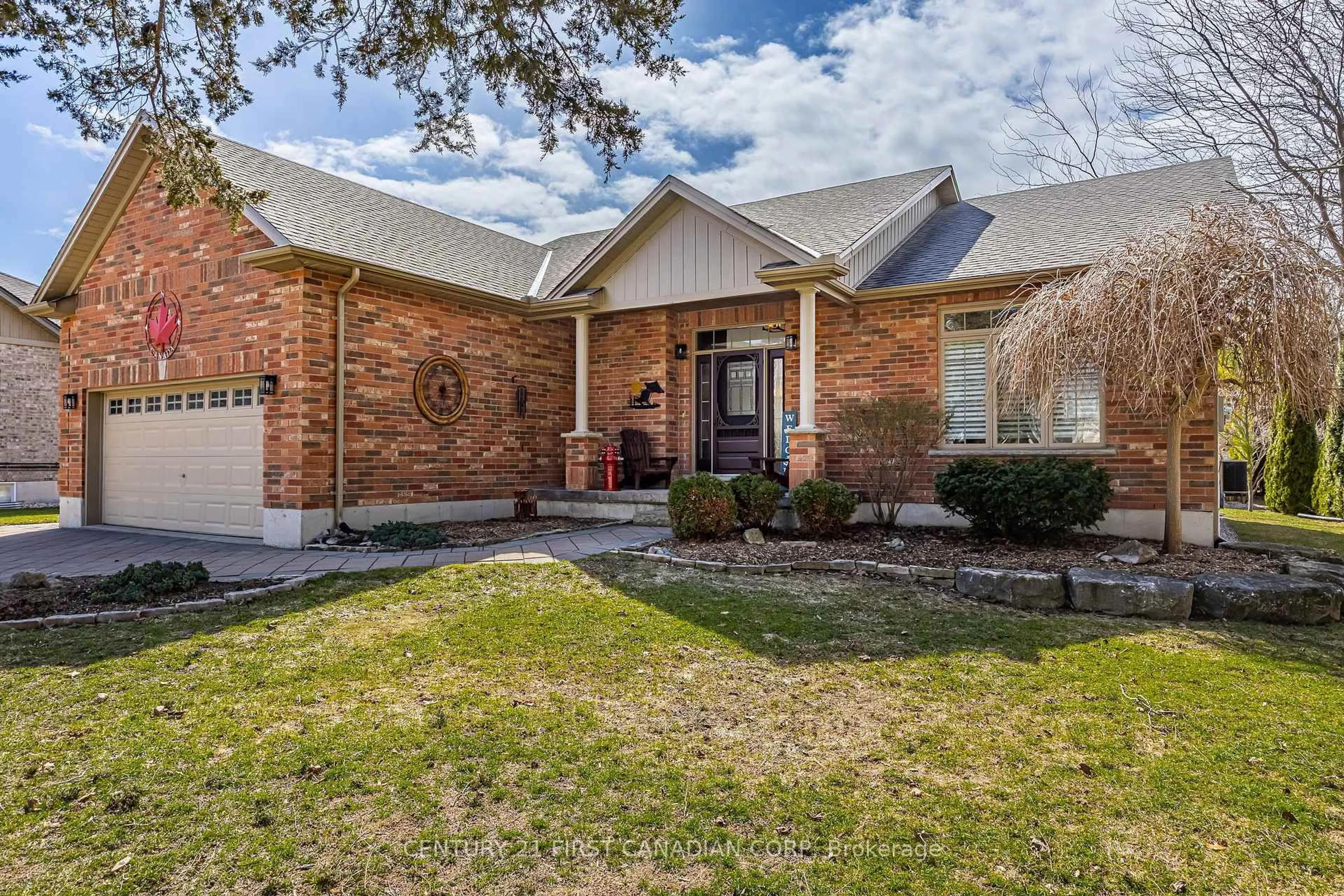 Home with brick exterior material, street for 10159 Meadowlilly Cres, Lambton Shores Ontario N0M 1T0