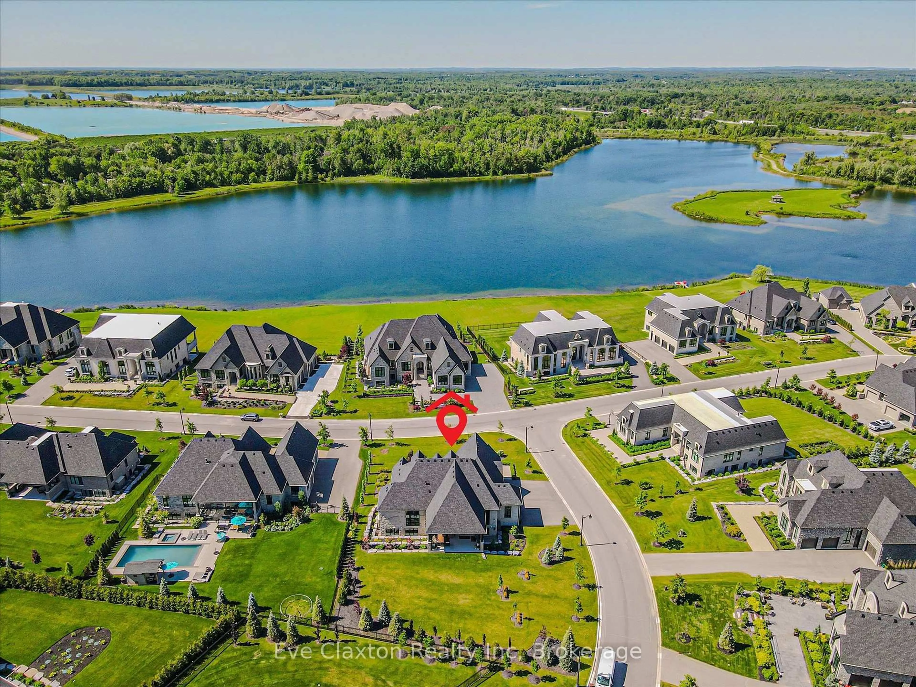 A pic from outside/outdoor area/front of a property/back of a property/a pic from drone, water/lake/river/ocean view for 112 Heritage Lake Dr, Puslinch Ontario N0B 2J0