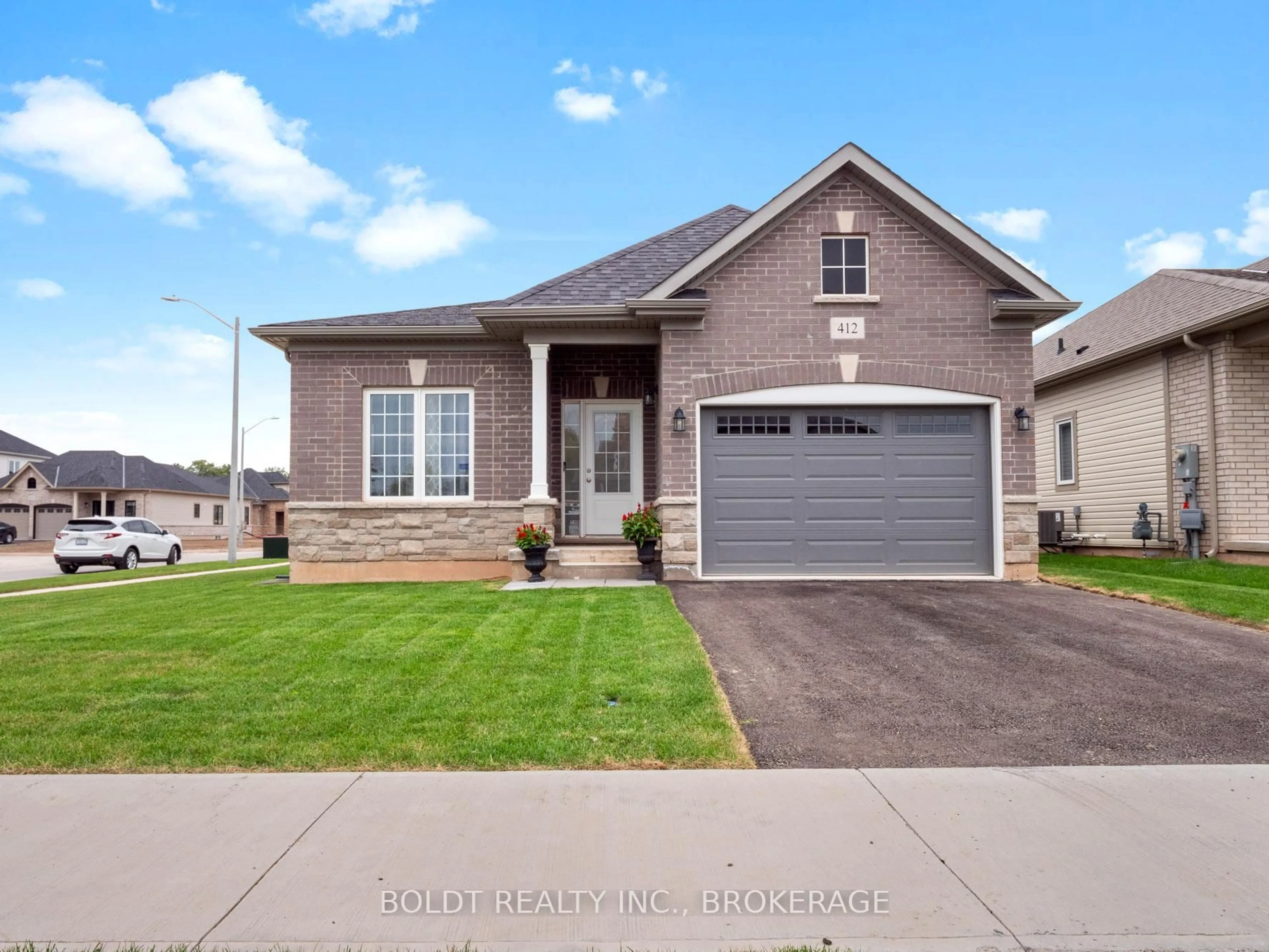 Home with brick exterior material, street for 412 Hummel Cres, Fort Erie Ontario L2A 0E8