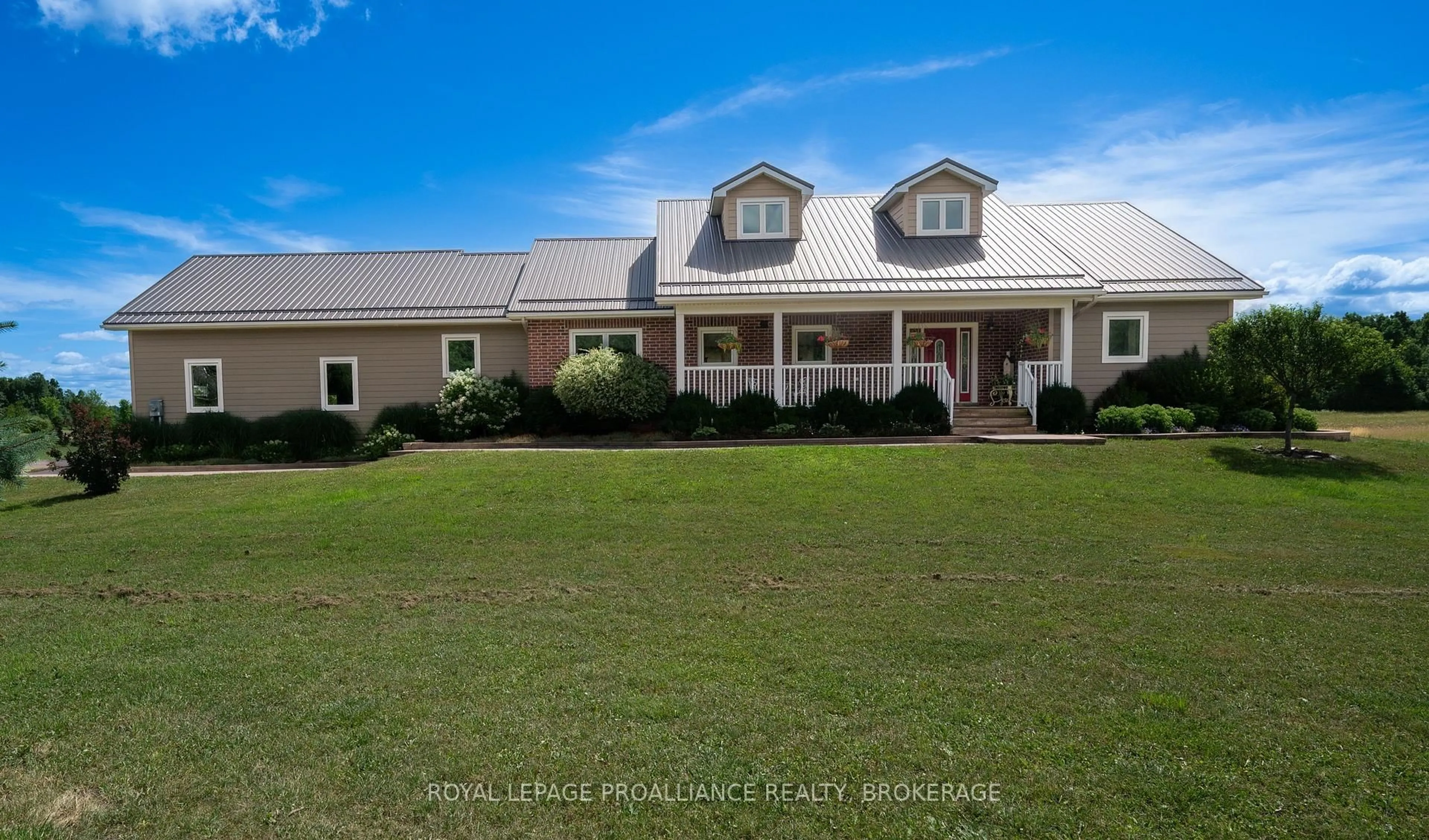 A pic from outside/outdoor area/front of a property/back of a property/a pic from drone, unknown for 303 Escott Rockport Rd, Leeds and the Thousand Islands Ontario K0E 1R0