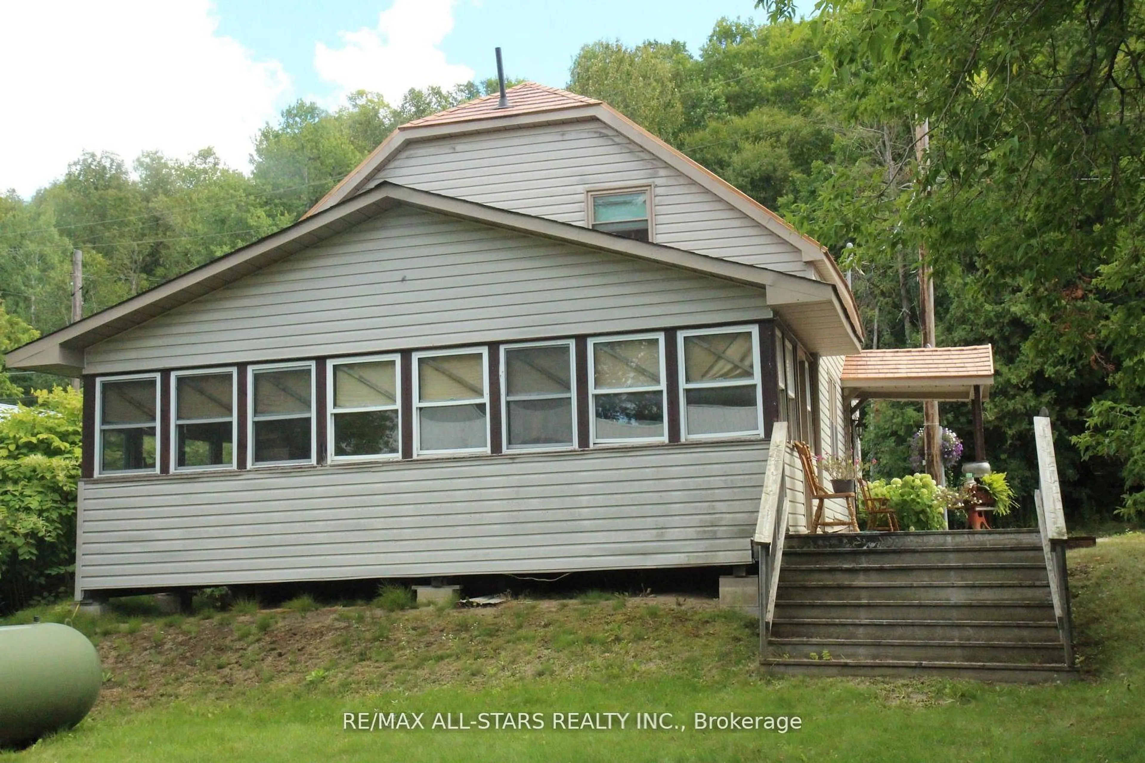 Home with vinyl exterior material, building for 77 Bobcaygeon Rd, Minden Hills Ontario K0M 2K0