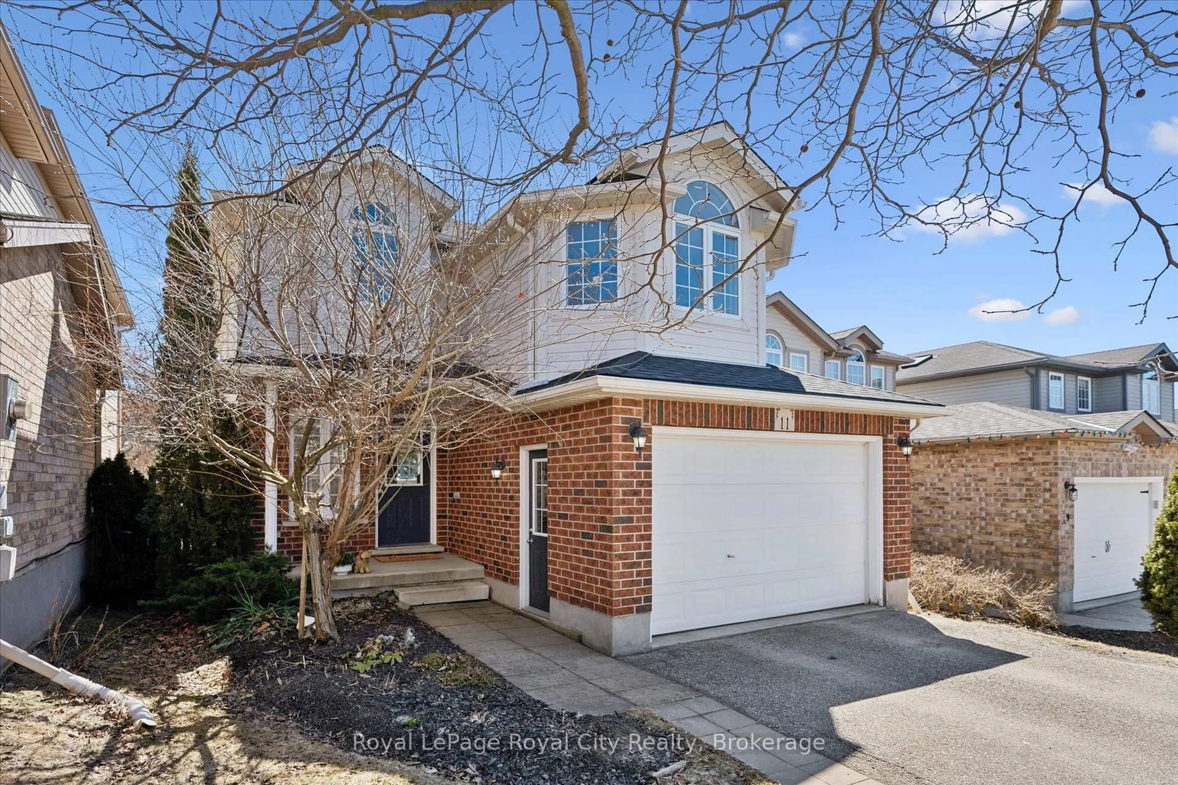 Home with brick exterior material, street for 11 Warren St, Guelph Ontario N1E 7K4