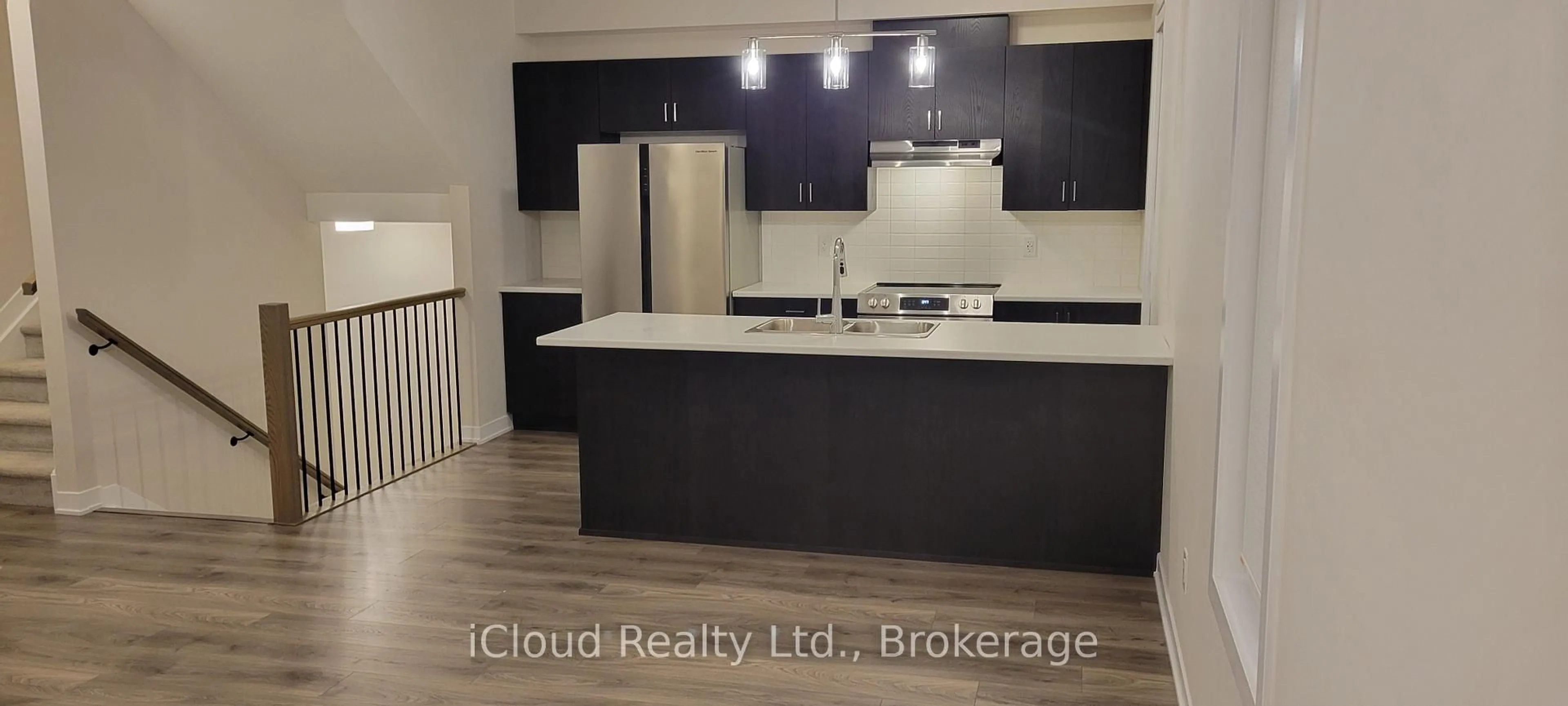 Open concept kitchen, wood/laminate floor for 318 Catsfoot Walk, Ottawa Ontario K2J 7G9