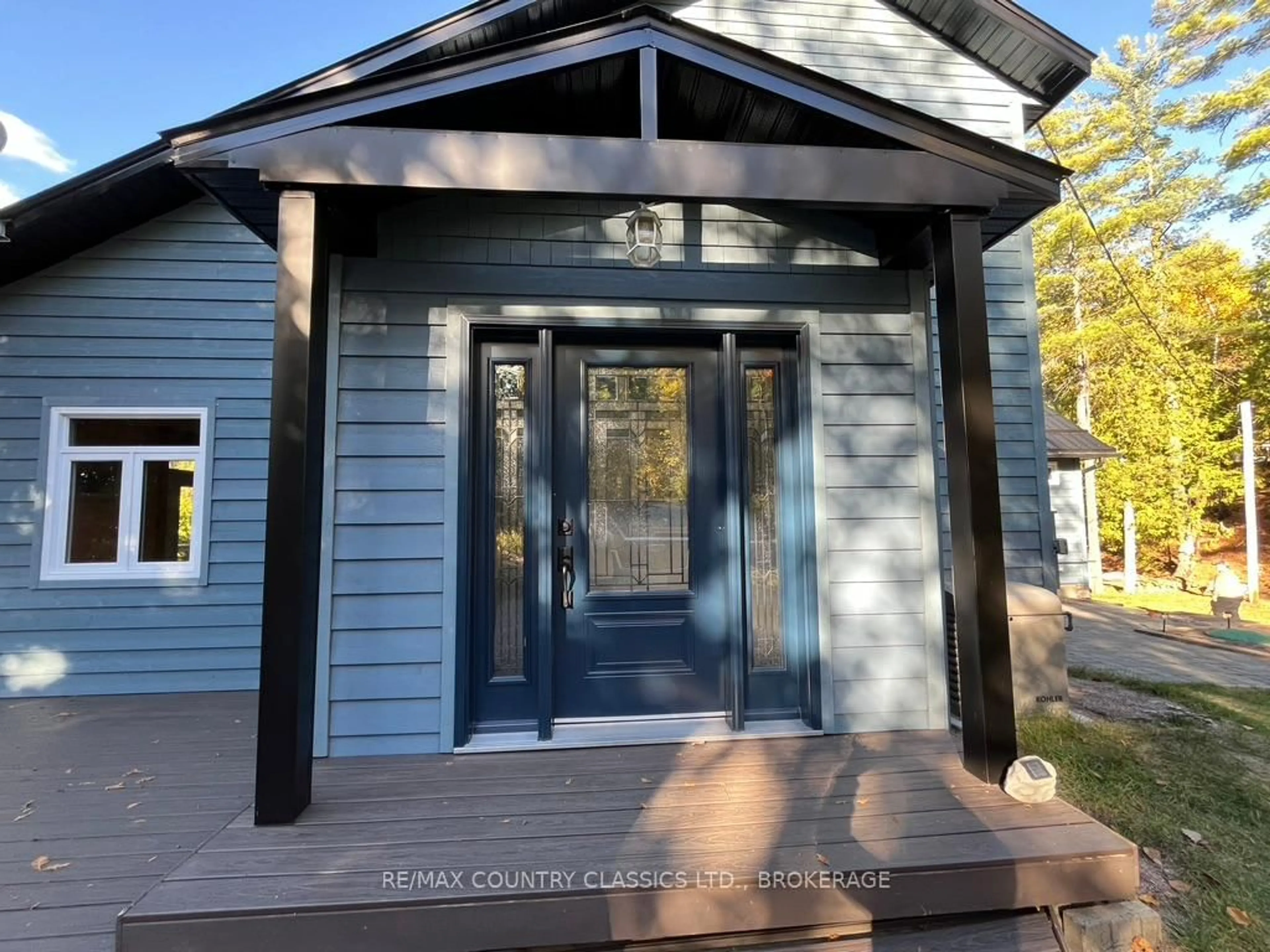 Home with vinyl exterior material, street for 1021 South Kash Lake Lane, Arden Ontario K0H 1B0