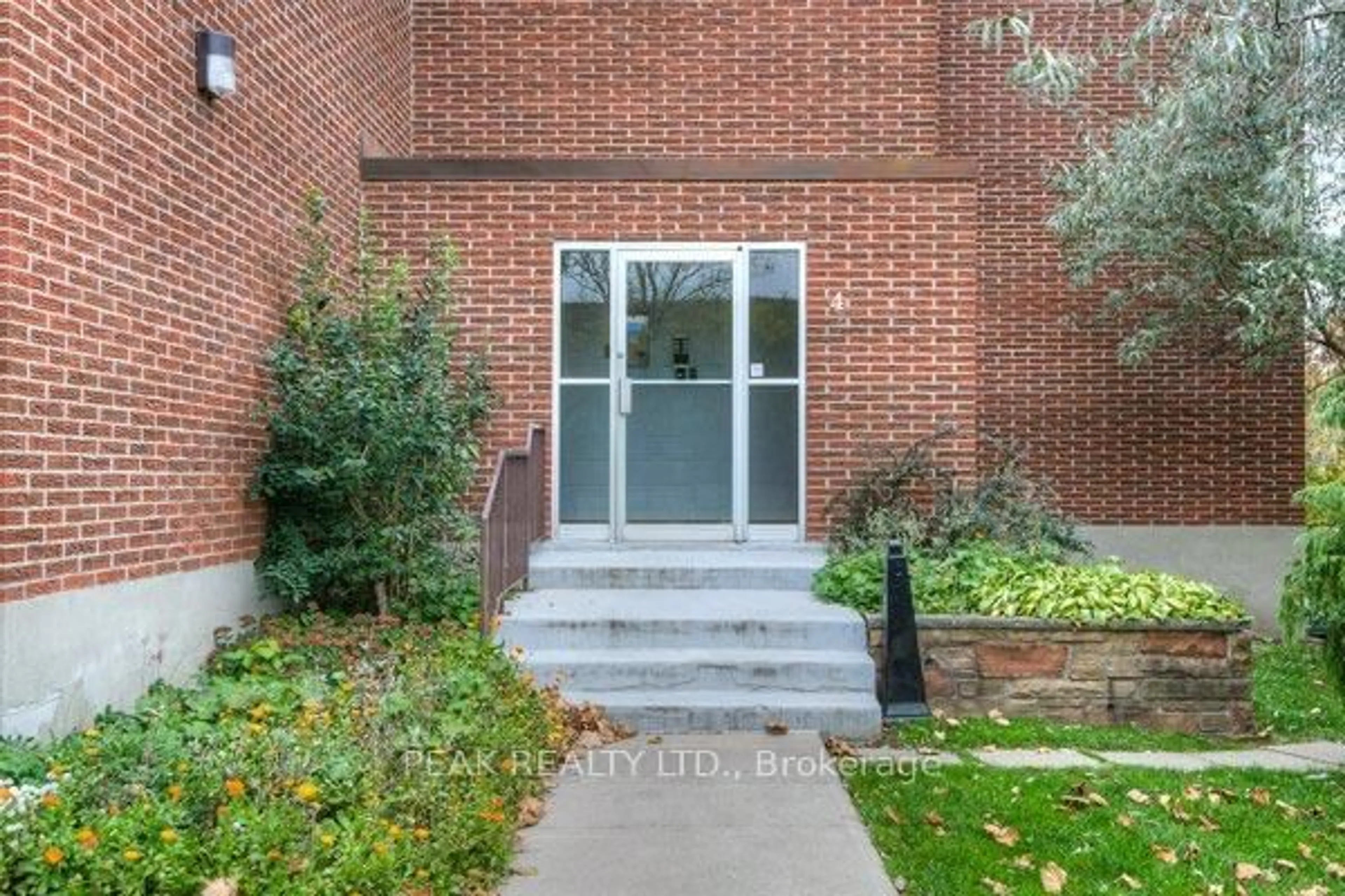 Home with brick exterior material, street for 4 Avalon Pl #106, Kitchener Ontario N2M 4N6