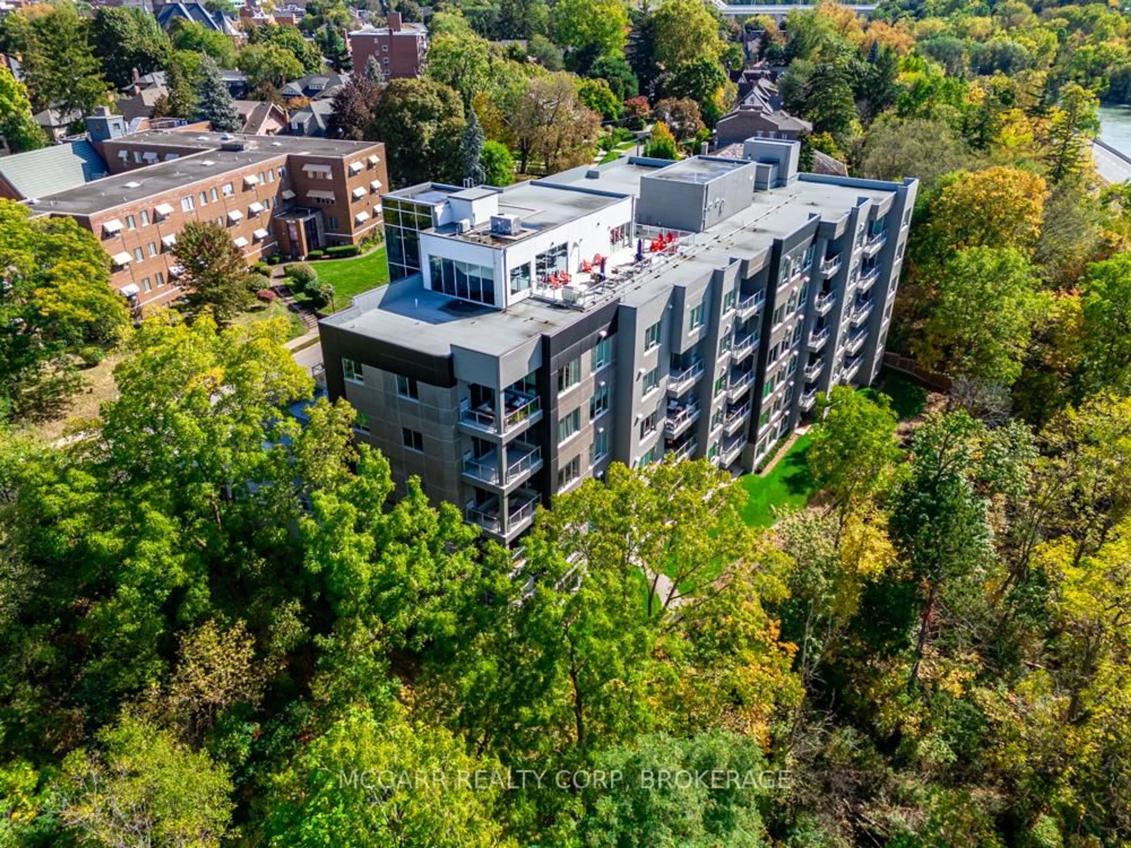 A pic from outside/outdoor area/front of a property/back of a property/a pic from drone, city buildings view from balcony for 77 Yates St #403, St. Catharines Ontario L2R 5R7