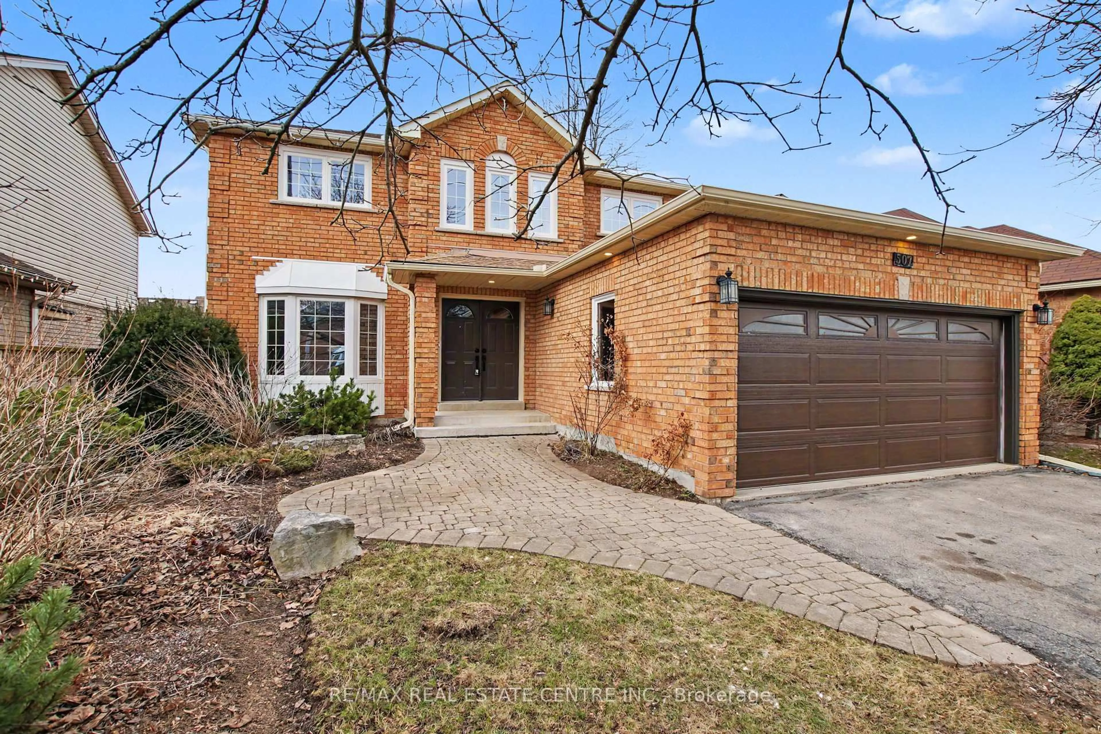Home with brick exterior material, street for 507 Grand Ridge Dr, Waterloo Ontario N1S 4Y9