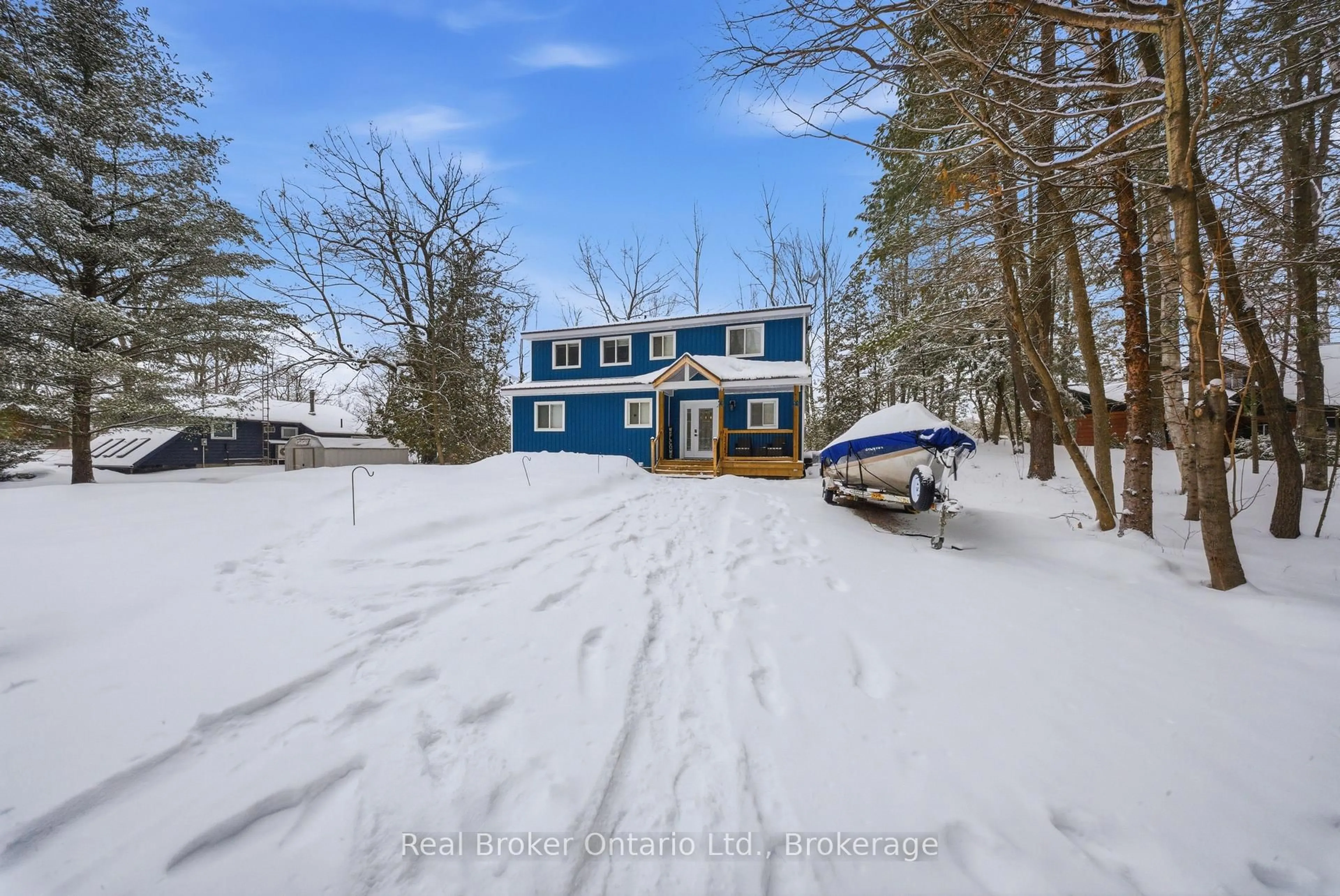 A pic from outside/outdoor area/front of a property/back of a property/a pic from drone, water/lake/river/ocean view for 135 Camp Lane, Tweed Ontario K0K 3J0