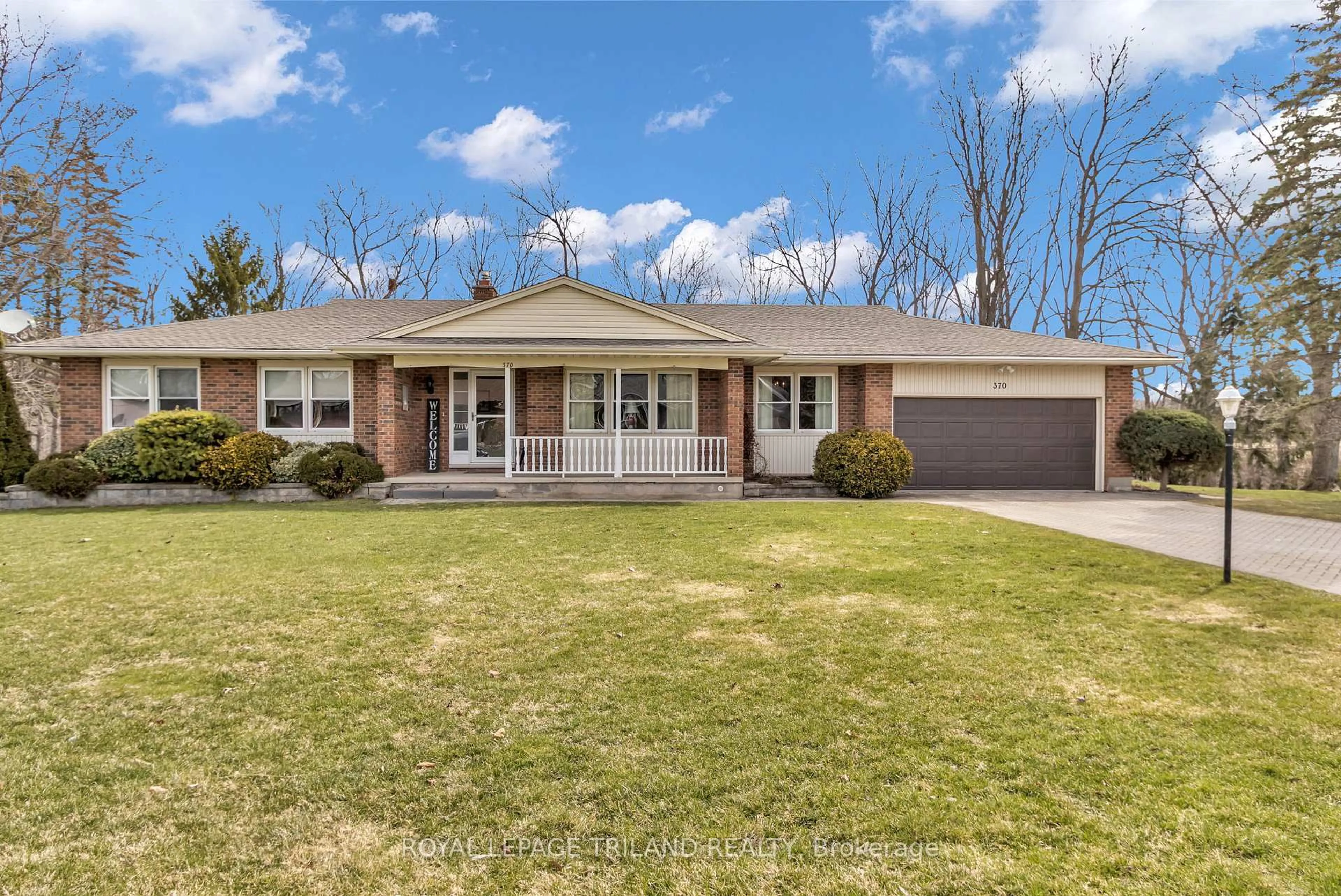 Home with brick exterior material, street for 370 STATION St, North Middlesex Ontario N0M 2K0