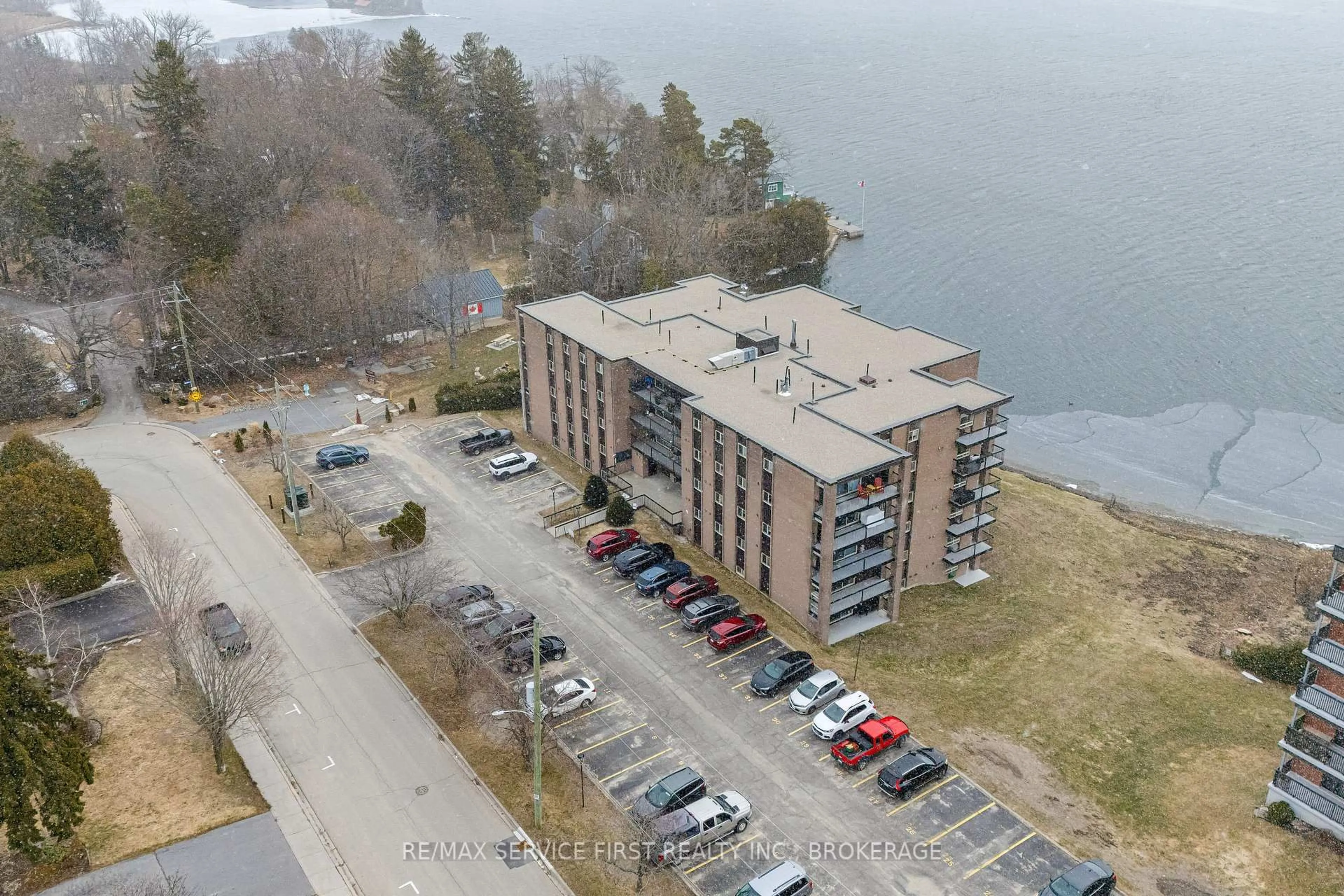 A pic from outside/outdoor area/front of a property/back of a property/a pic from drone, water/lake/river/ocean view for 610 William St #301, Gananoque Ontario K7G 3A4