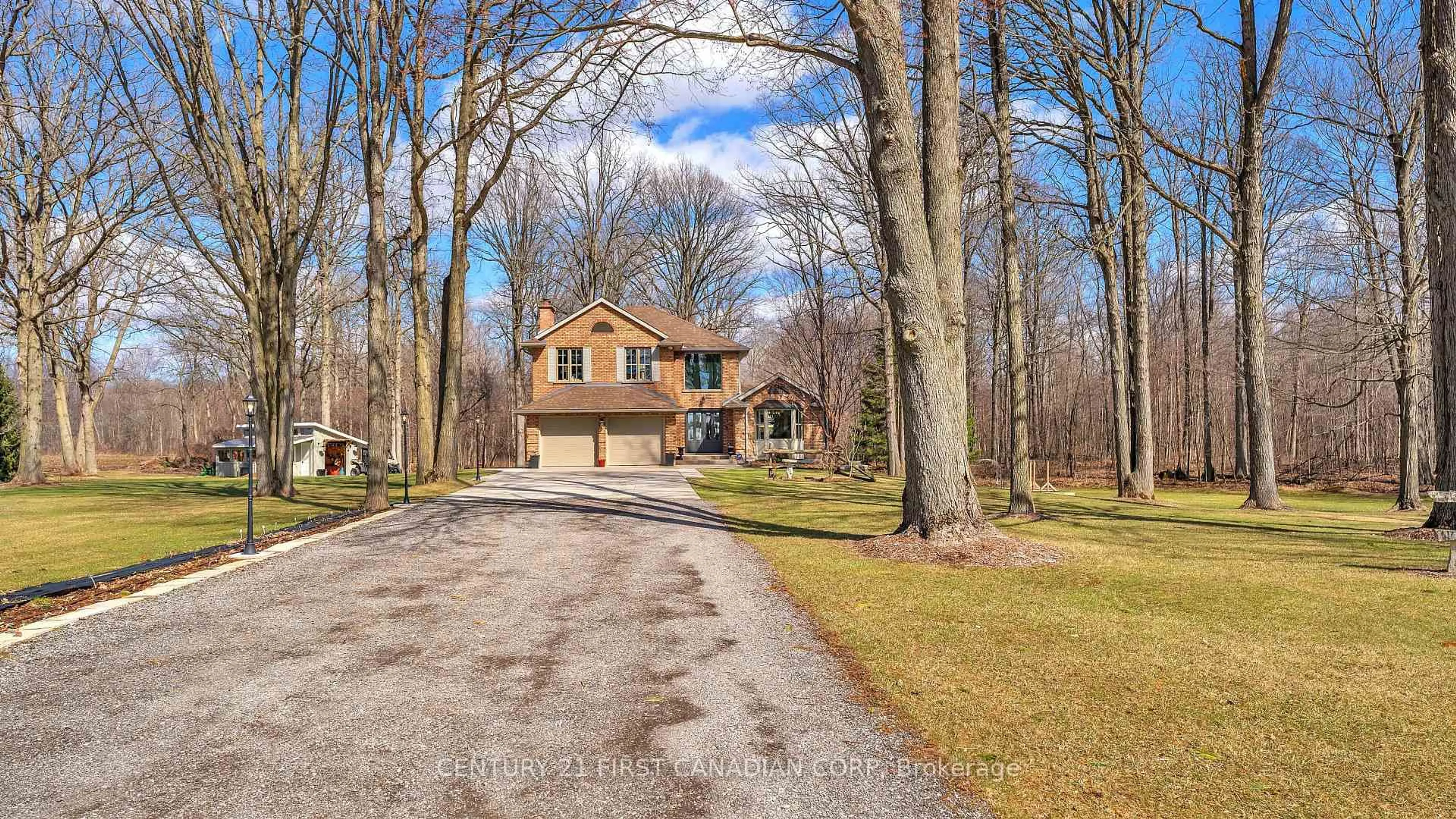 A pic from outside/outdoor area/front of a property/back of a property/a pic from drone, street for 7056 Cook Rd, Middlesex Centre Ontario N6P 1P3