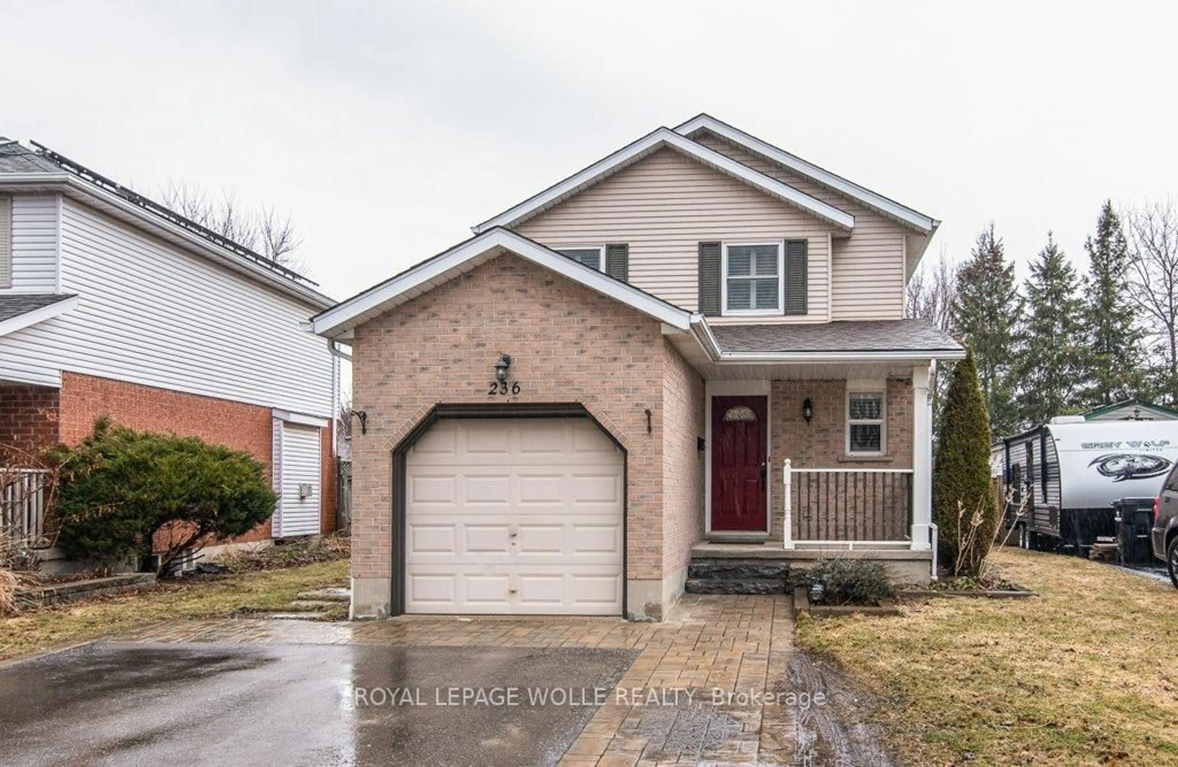 Home with brick exterior material, street for 236 Dartmoor Cres, Waterloo Ontario N2K 2S9