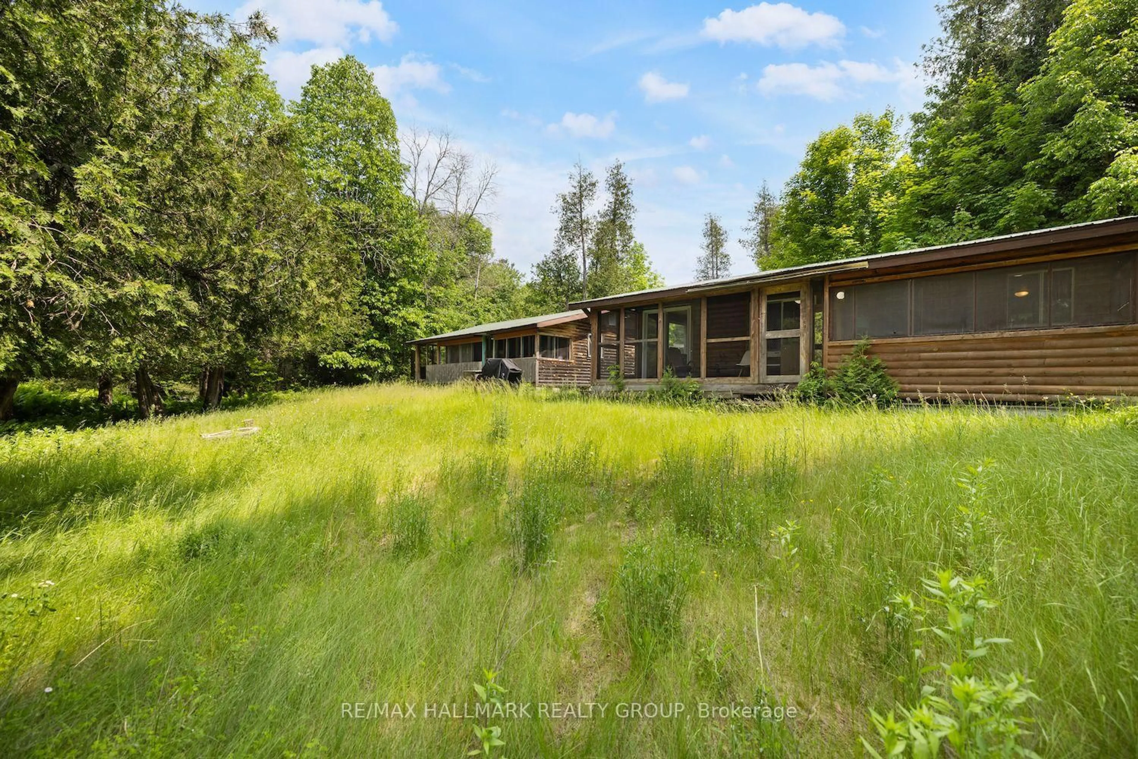 A pic from outside/outdoor area/front of a property/back of a property/a pic from drone, forest/trees view for 115 Clyde Lane, Lanark Ontario K0G 1K0
