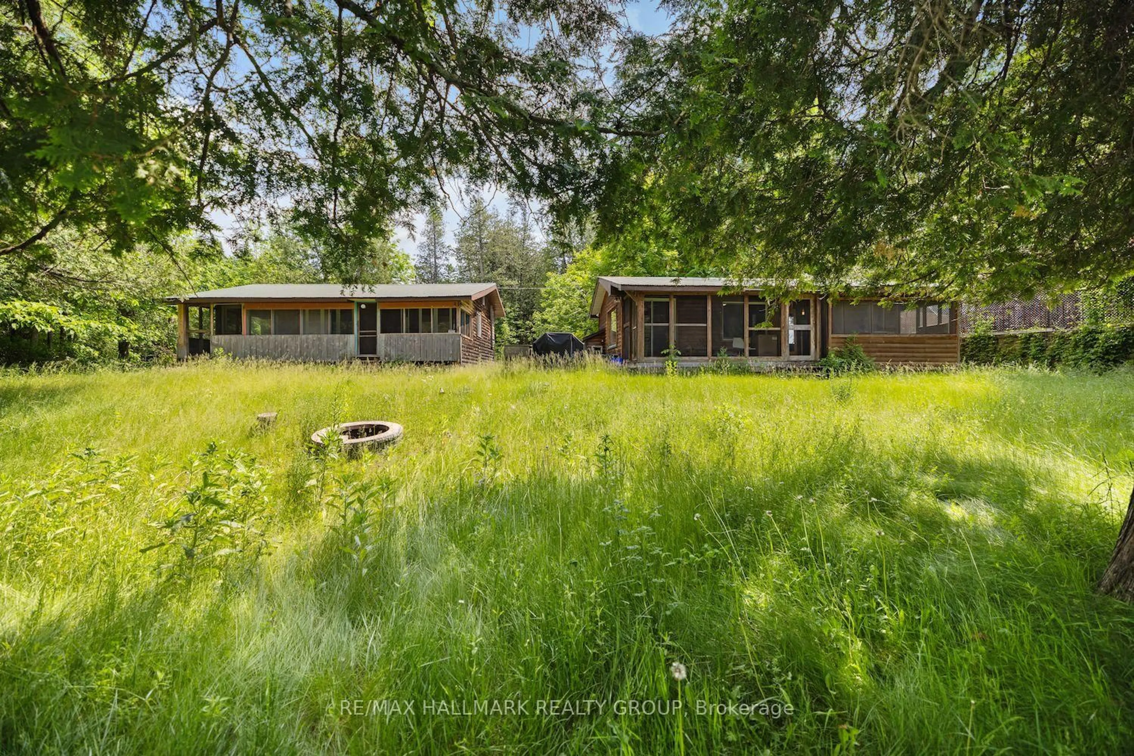 A pic from outside/outdoor area/front of a property/back of a property/a pic from drone, forest/trees view for 115 Clyde Lane, Lanark Ontario K0G 1K0