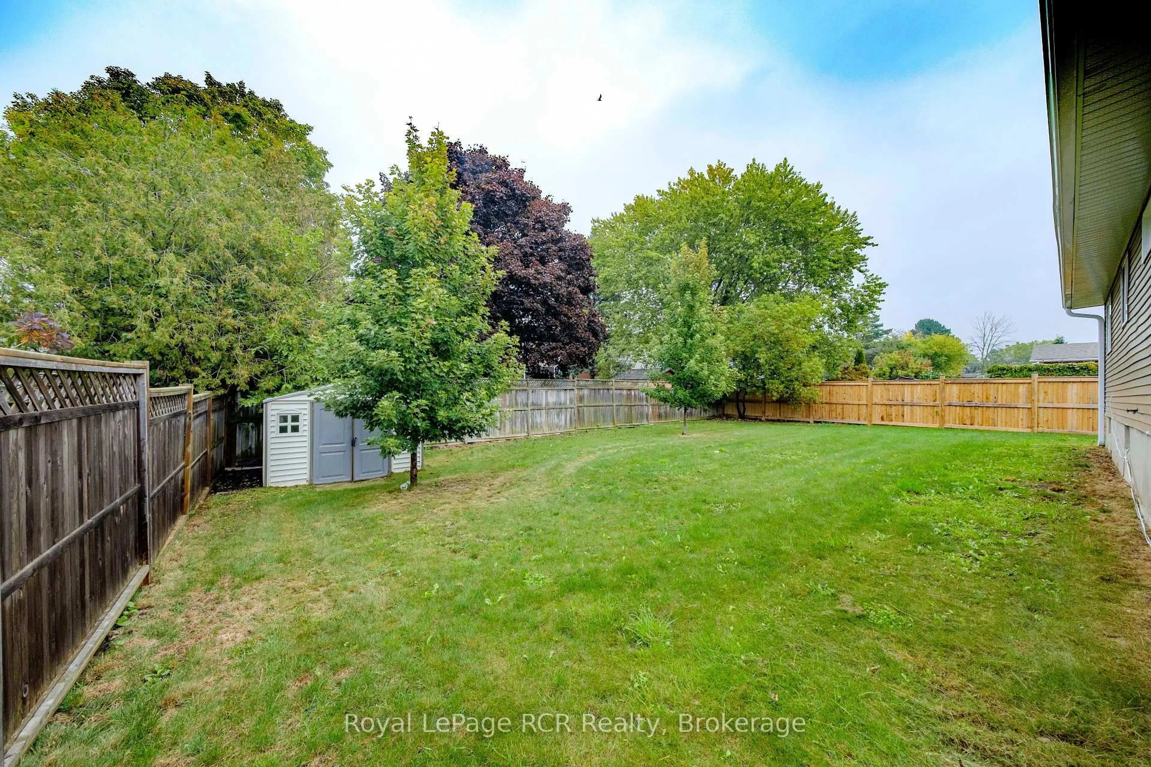 A pic from outside/outdoor area/front of a property/back of a property/a pic from drone, forest/trees view for 427 Highland Dr, Kincardine Ontario N2Z 1X4