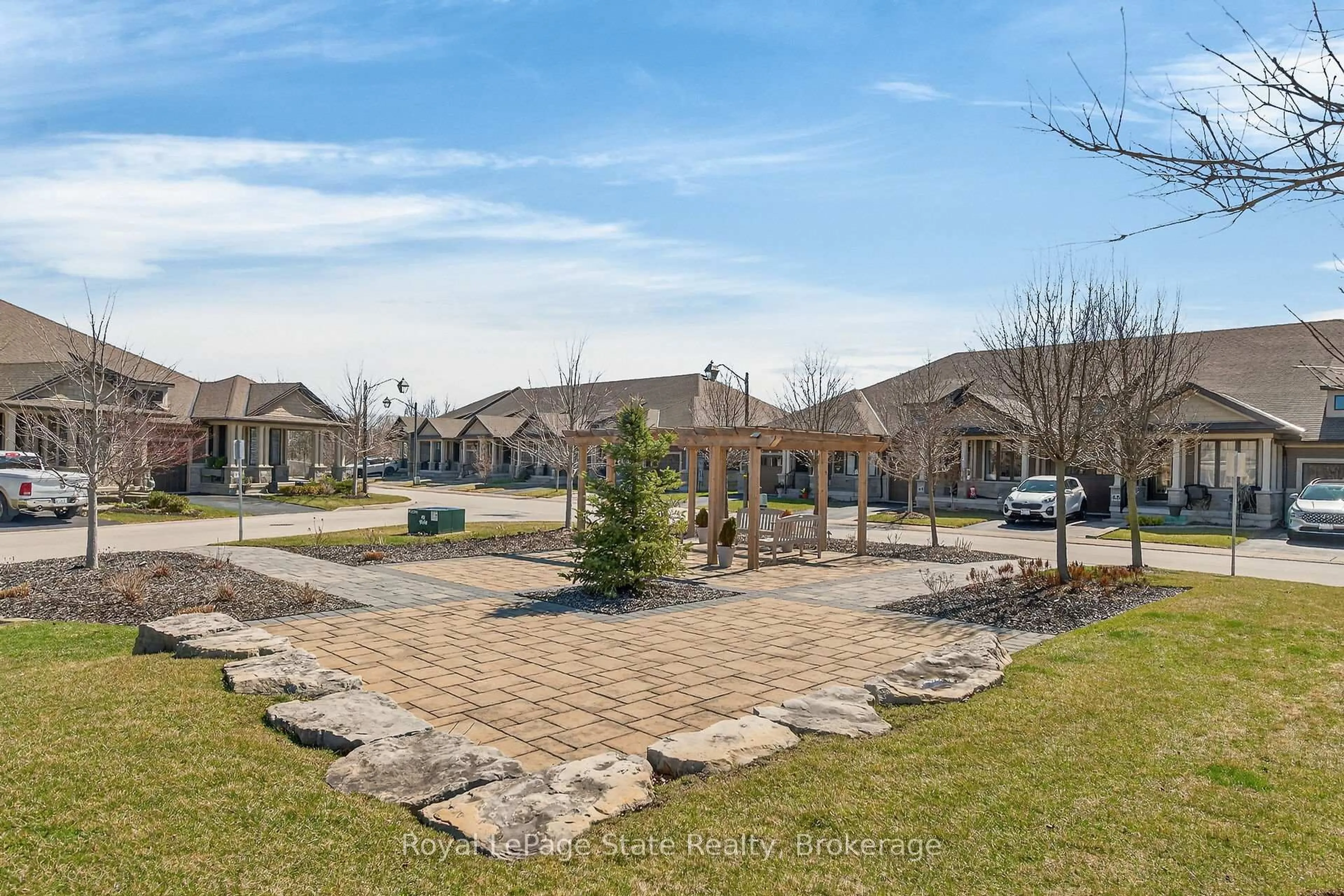 A pic from outside/outdoor area/front of a property/back of a property/a pic from drone, street for 37 Brookside Terr #16, West Lincoln Ontario L0R 2A0