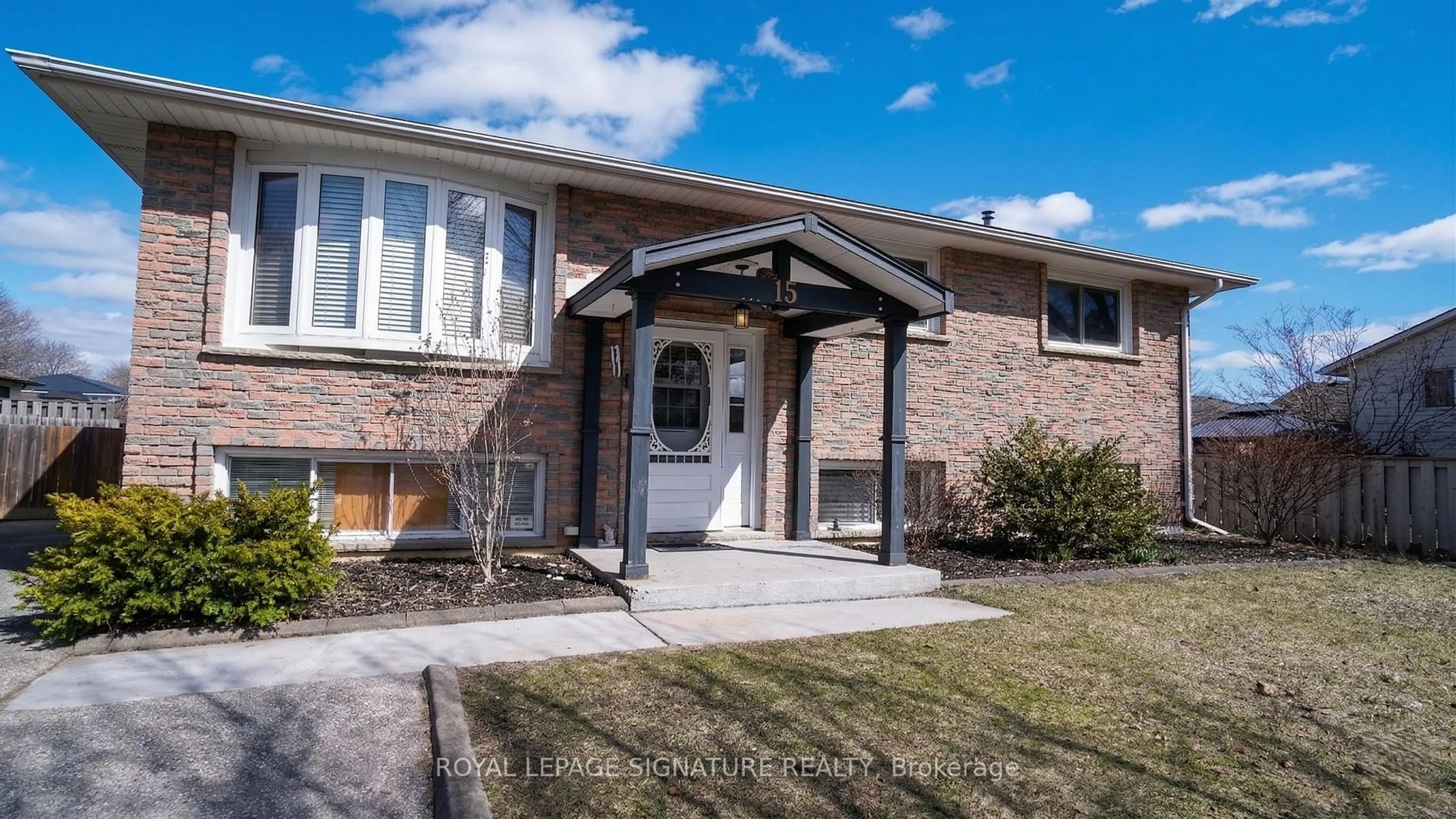 Home with brick exterior material, street for 15 Douglas Ave, Norfolk Ontario N3Y 4Z1