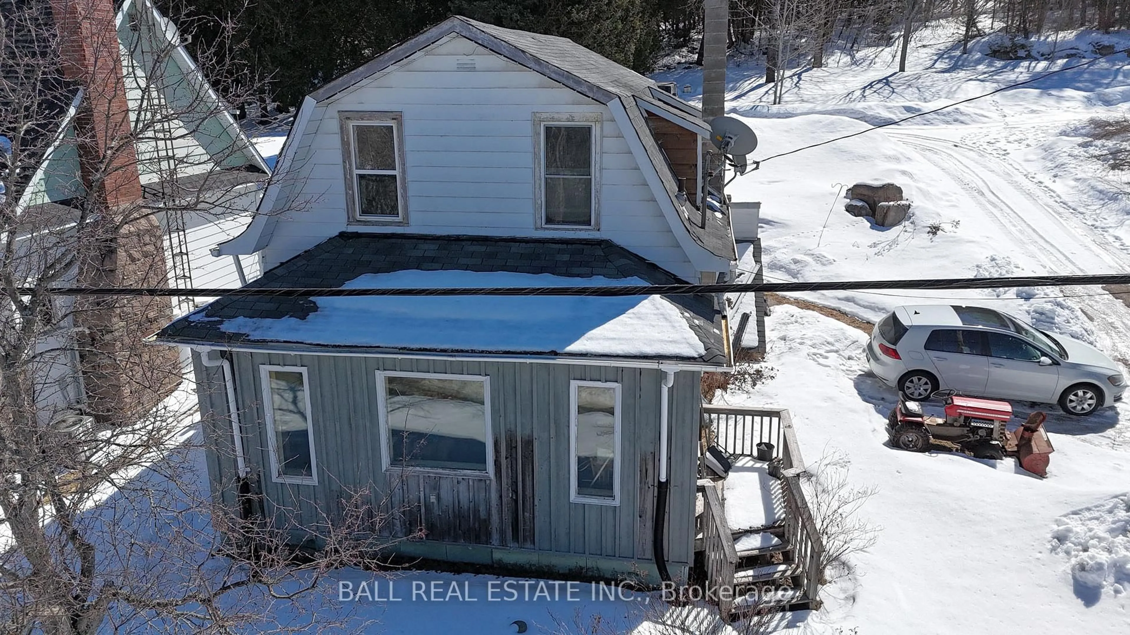 A pic from outside/outdoor area/front of a property/back of a property/a pic from drone, street for 13068 County Road 503, Highlands East Ontario K0L 2Y0