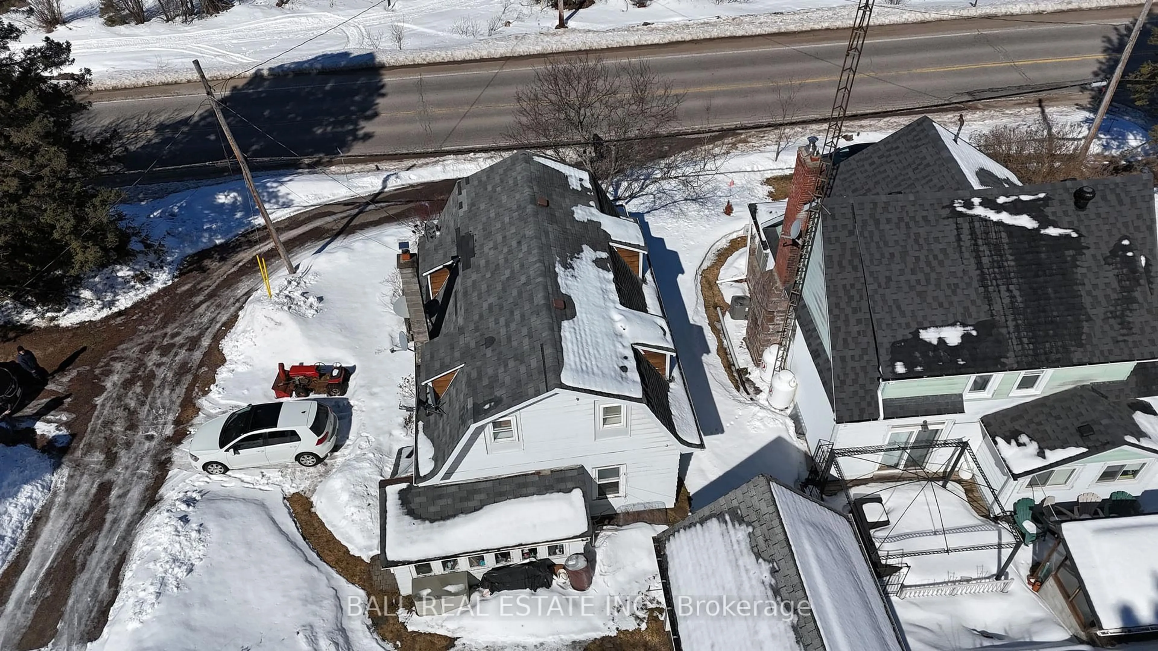 A pic from outside/outdoor area/front of a property/back of a property/a pic from drone, street for 13068 County Road 503, Highlands East Ontario K0L 2Y0