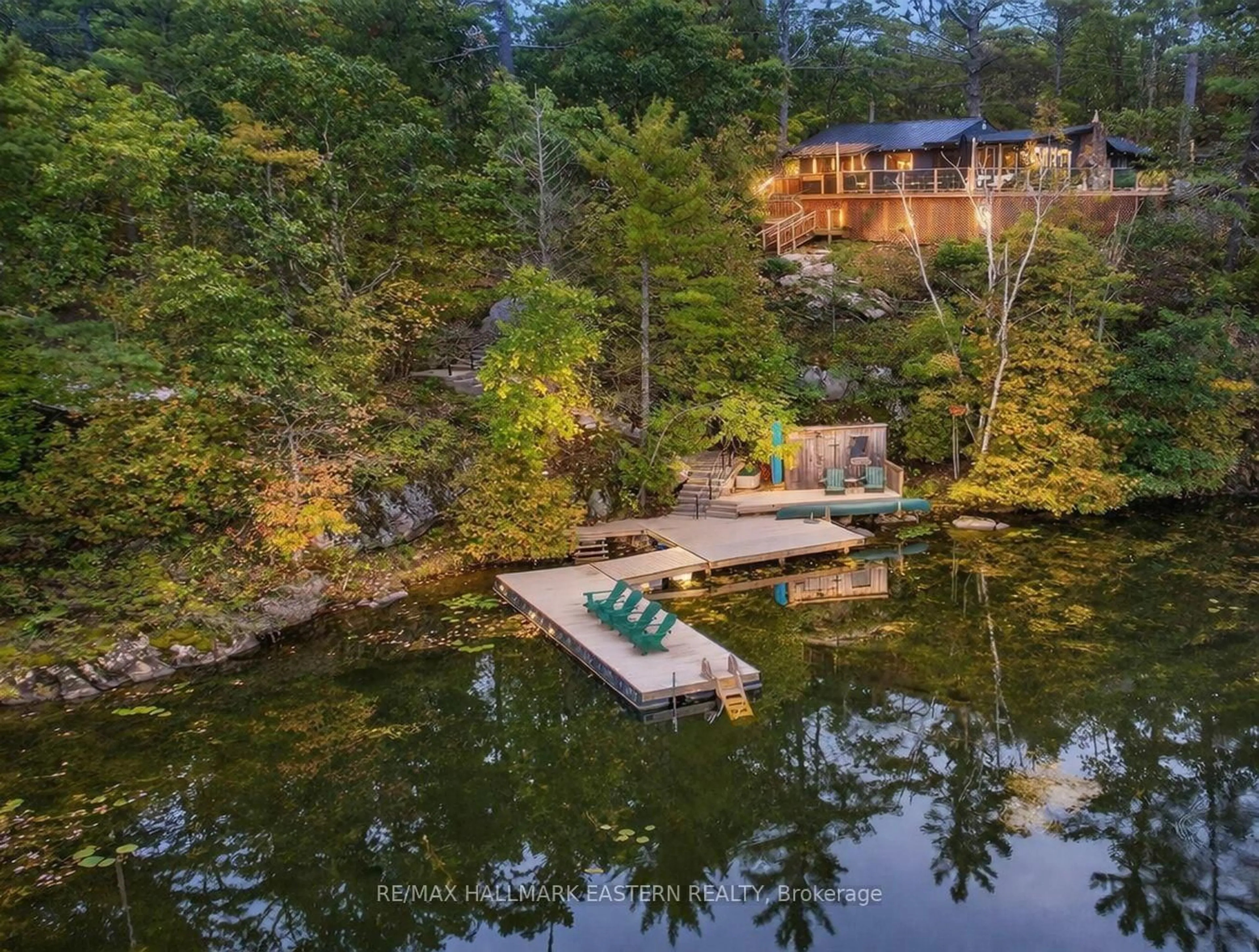 A pic from outside/outdoor area/front of a property/back of a property/a pic from drone, water/lake/river/ocean view for 2712 Channel View Lane, Selwyn Ontario K0L 2H0