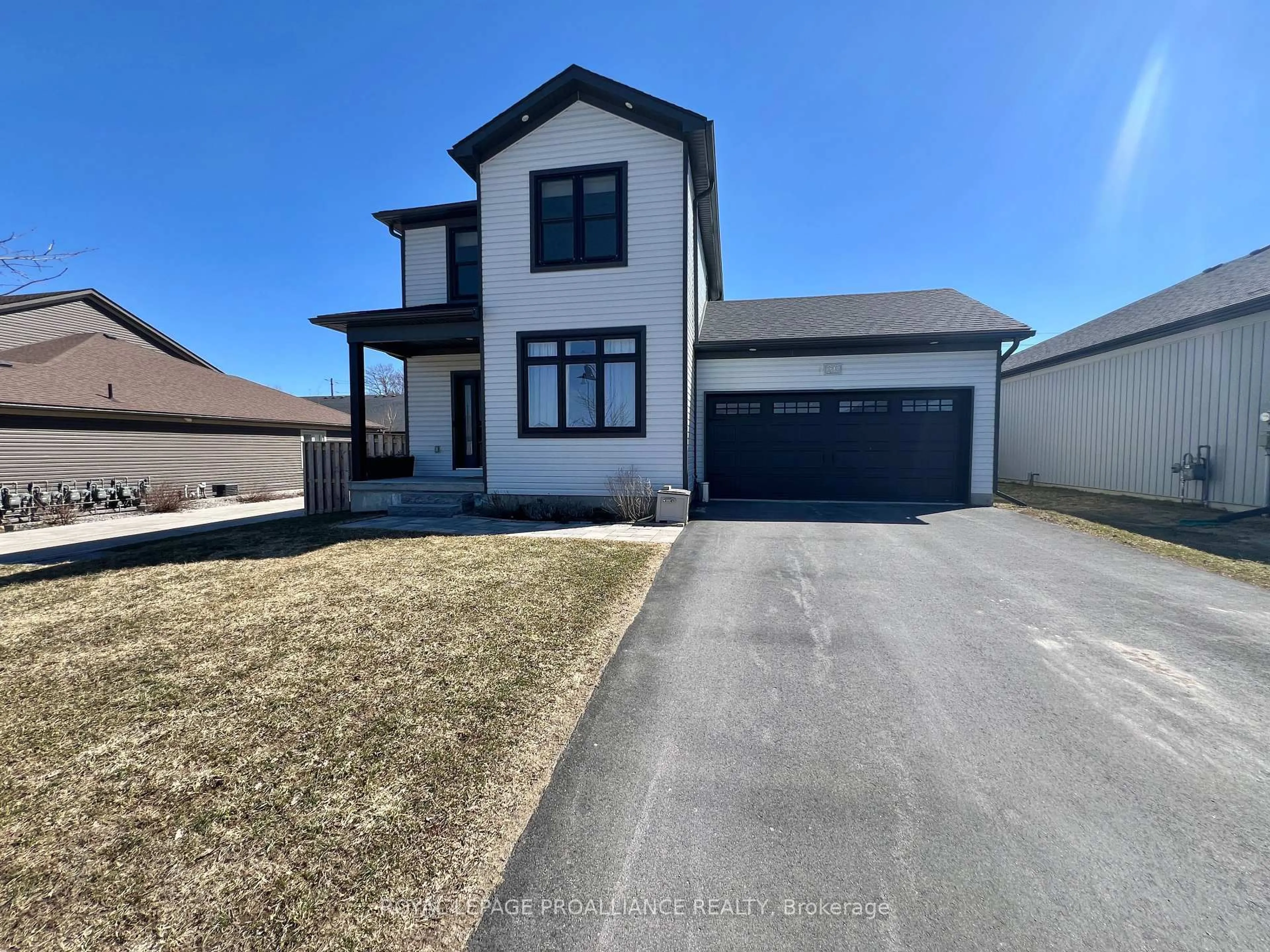 A pic from outside/outdoor area/front of a property/back of a property/a pic from drone, street for 26 Curtis St, Prince Edward County Ontario K0K 2T0