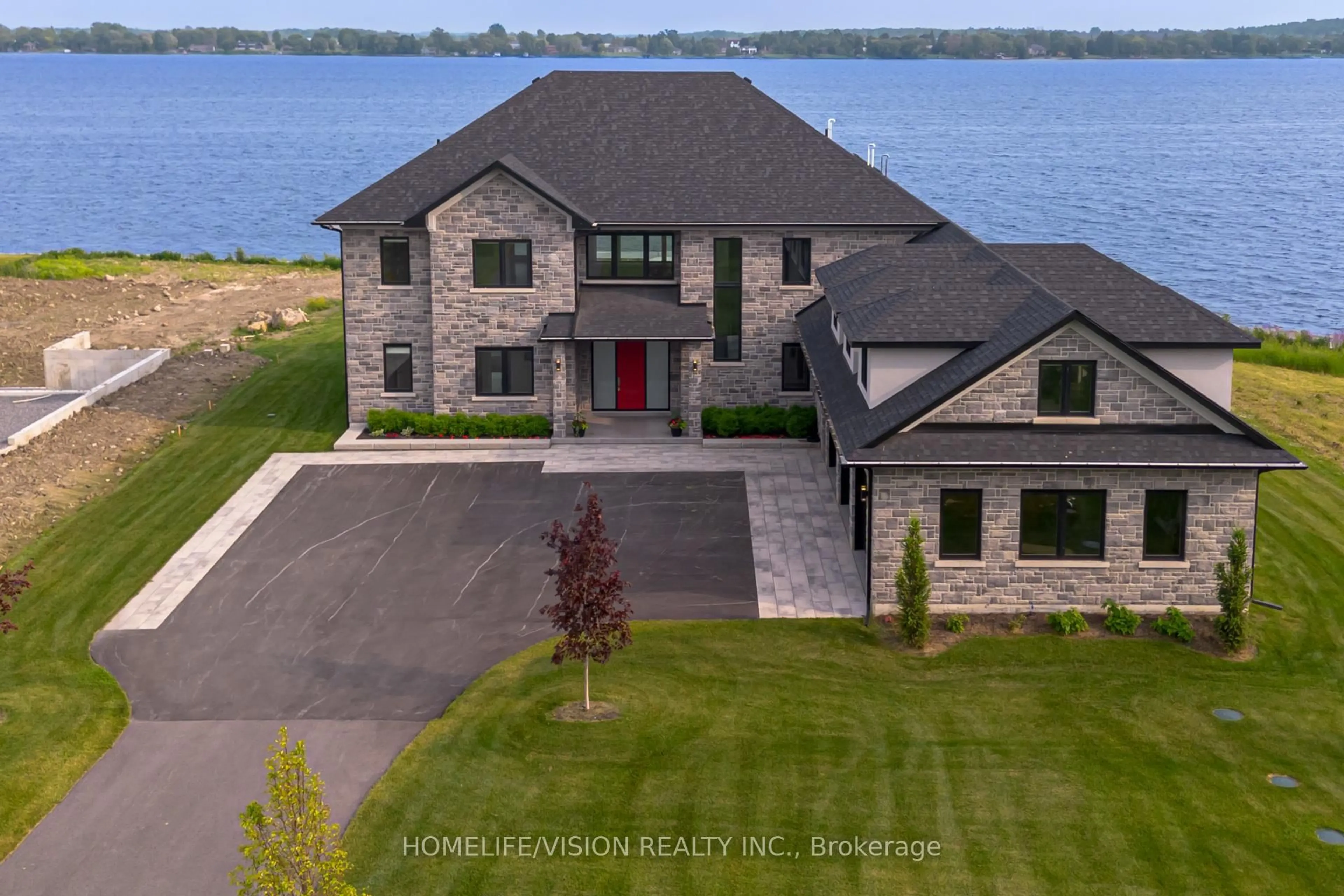 A pic from outside/outdoor area/front of a property/back of a property/a pic from drone, water/lake/river/ocean view for 1828 Old Highway 2, Belleville Ontario K8N 4Z2