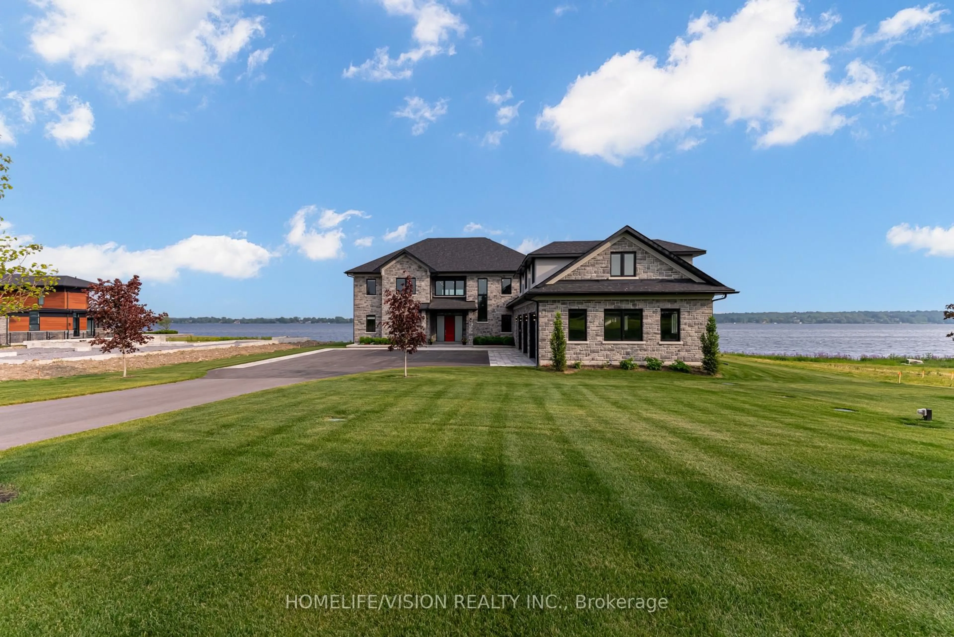 A pic from outside/outdoor area/front of a property/back of a property/a pic from drone, water/lake/river/ocean view for 1828 Old Highway 2, Belleville Ontario K8N 4Z2