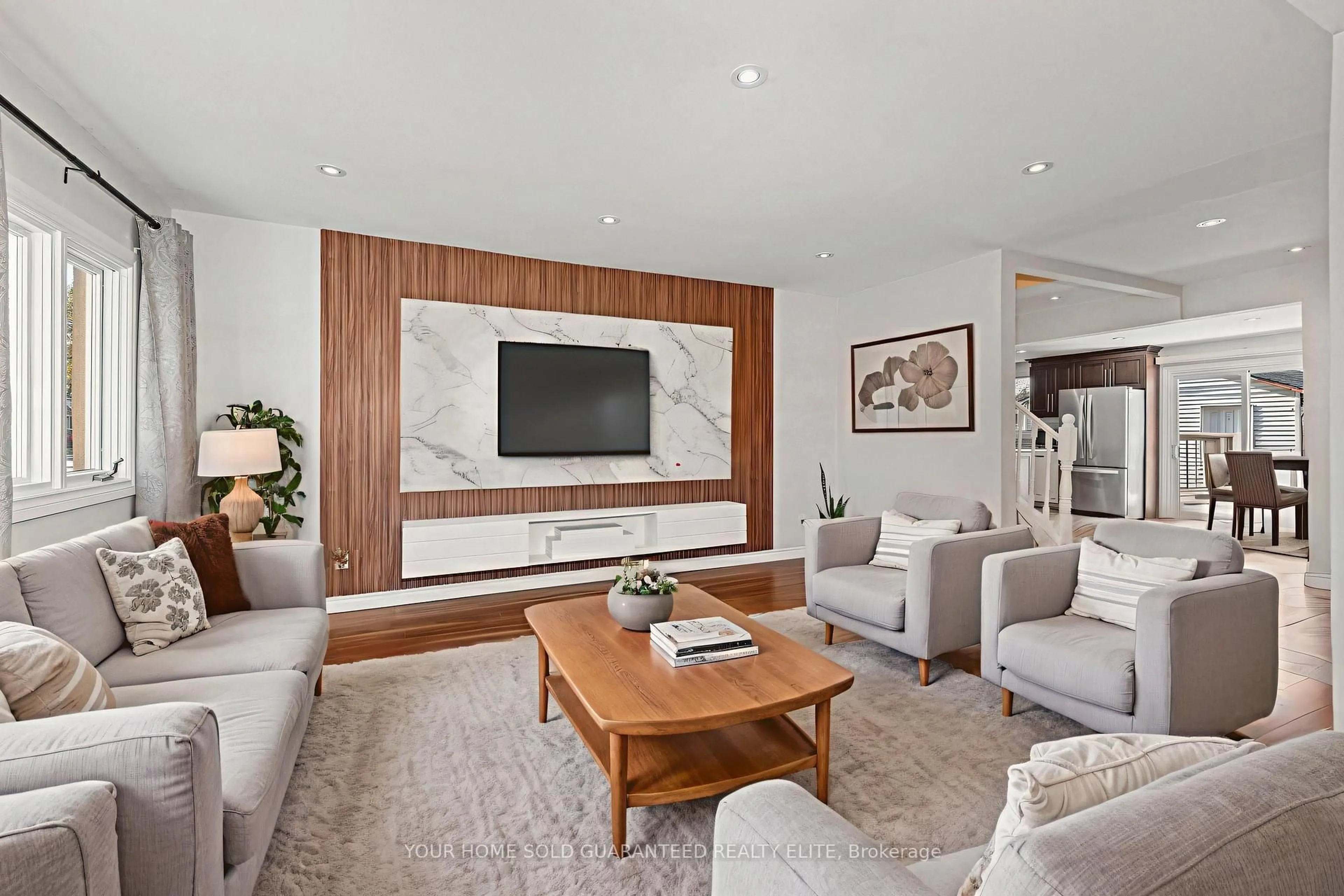 Living room with furniture, wood/laminate floor for 233 Normanhurst Ave, Hamilton Ontario L8H 5N1