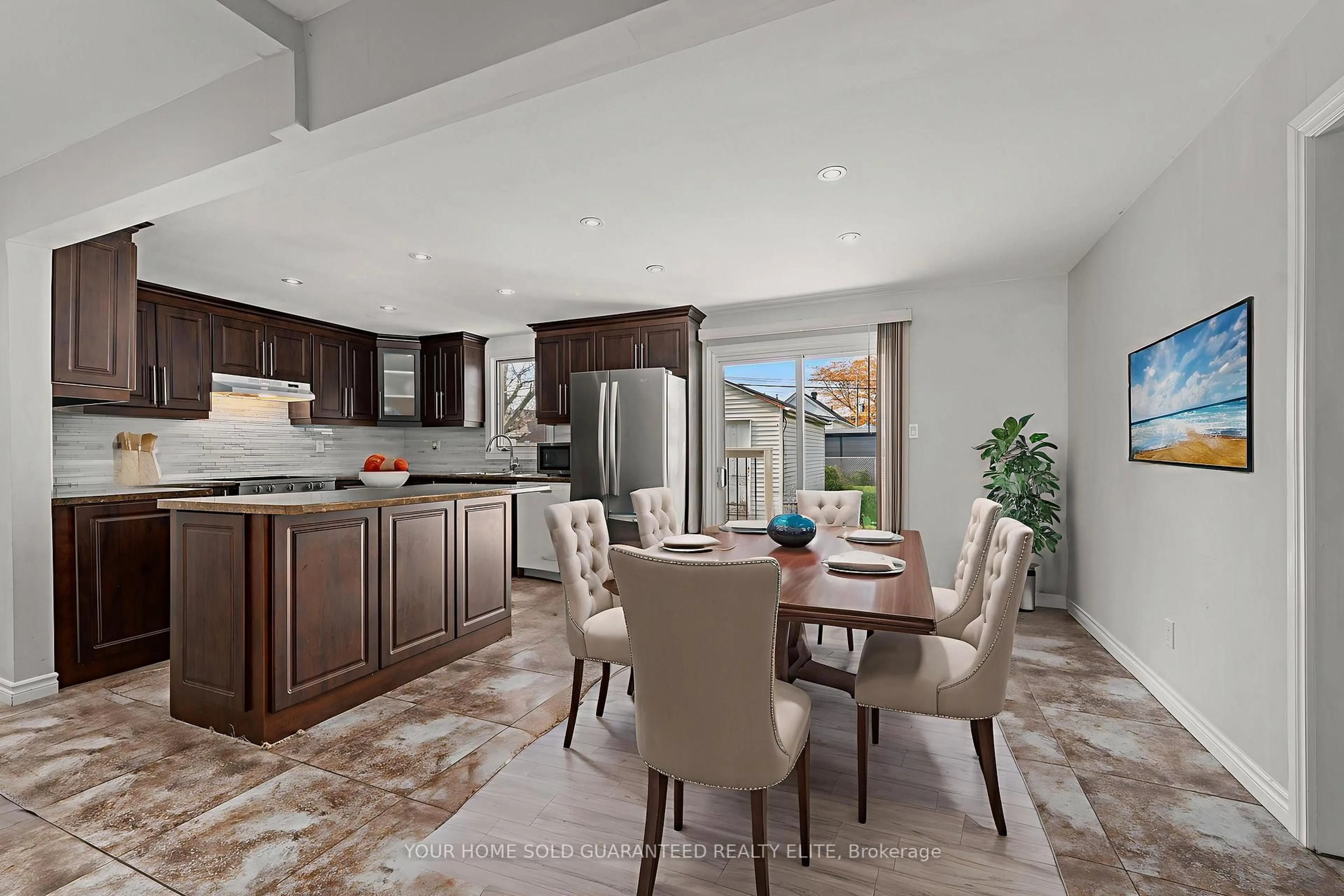 Open concept kitchen, ceramic/tile floor for 233 Normanhurst Ave, Hamilton Ontario L8H 5N1