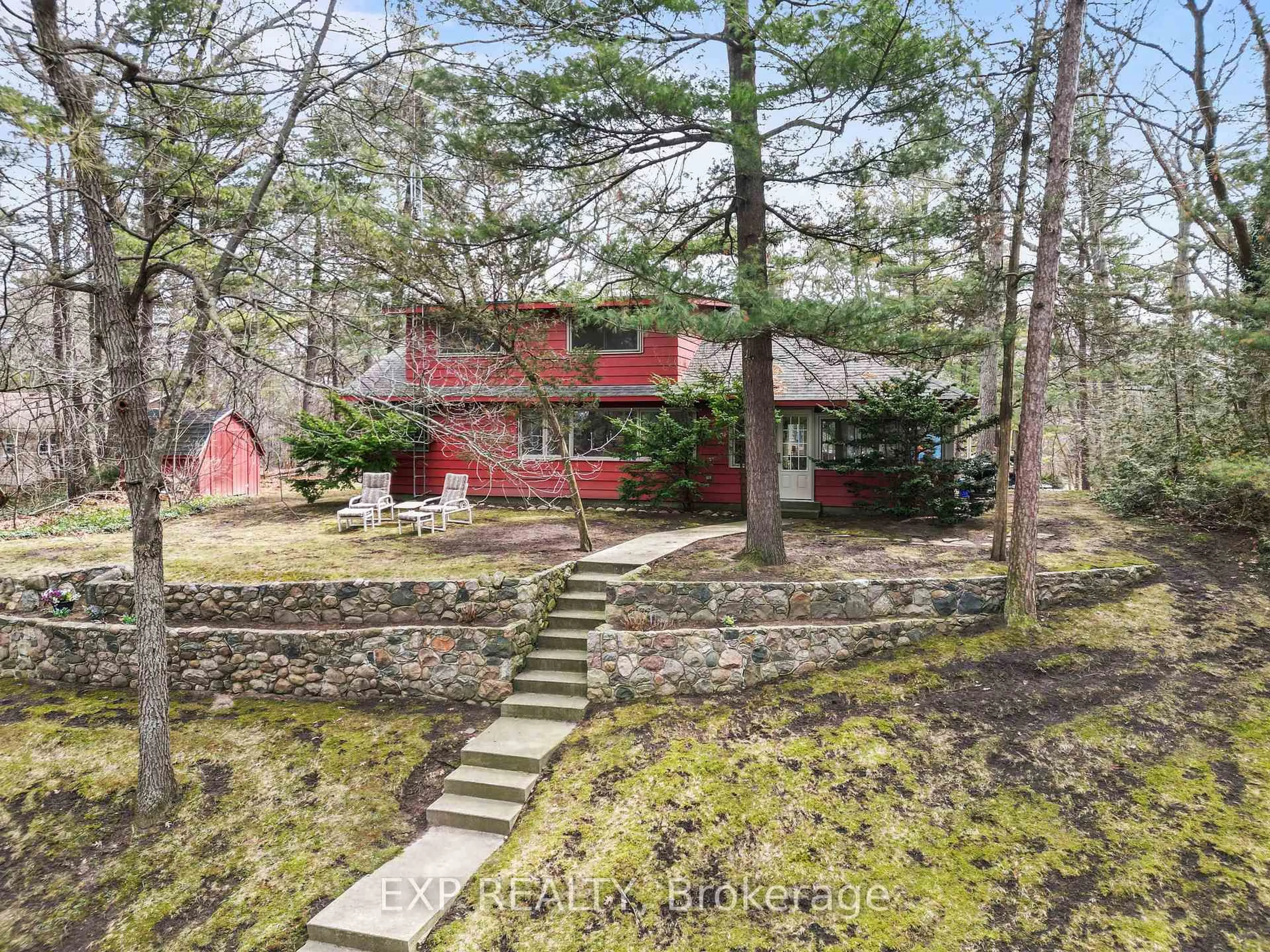 A pic from outside/outdoor area/front of a property/back of a property/a pic from drone, forest/trees view for 9 Summit Ave, South Huron Ontario N0M 1T0