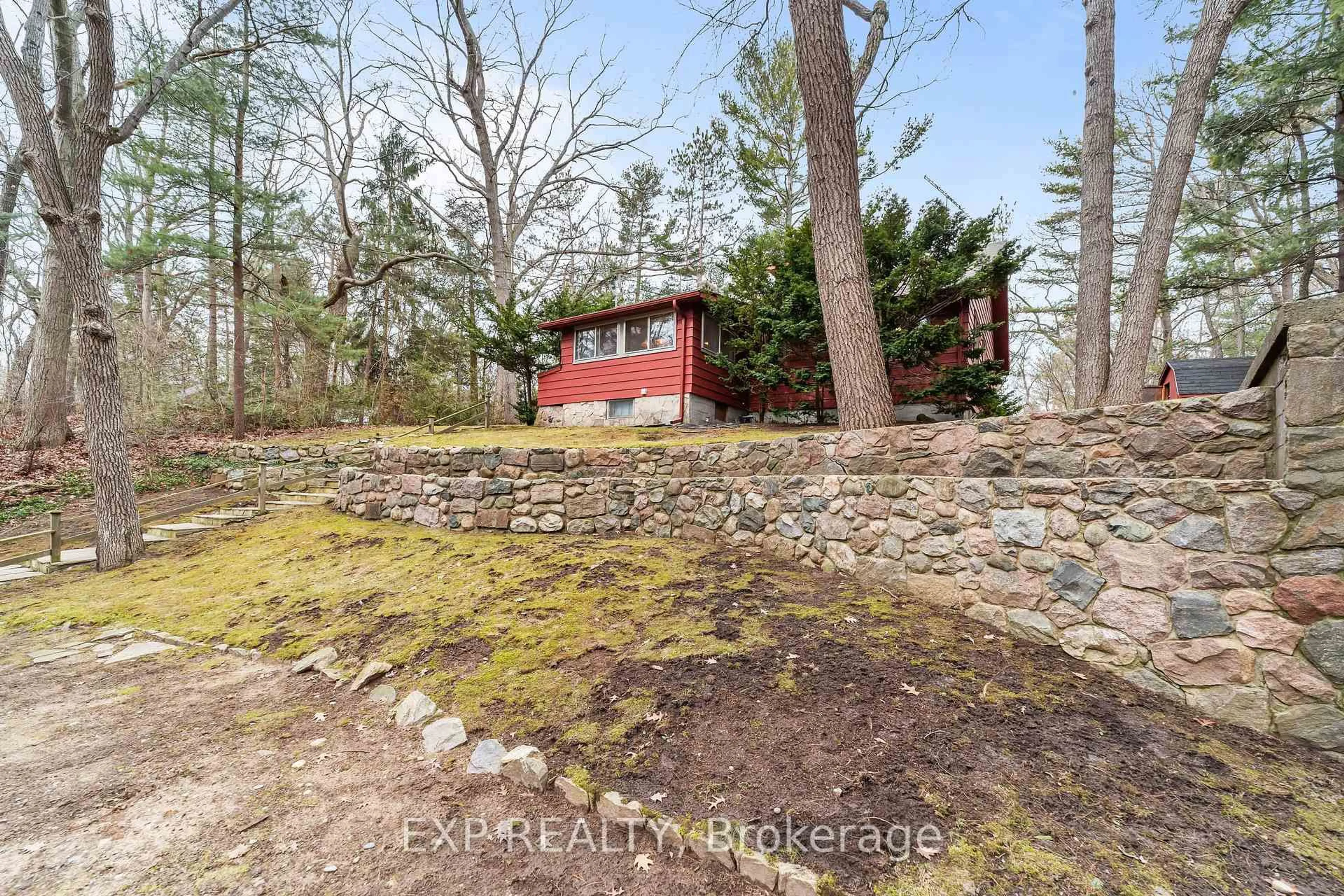 A pic from outside/outdoor area/front of a property/back of a property/a pic from drone, forest/trees view for 9 Summit Ave, South Huron Ontario N0M 1T0