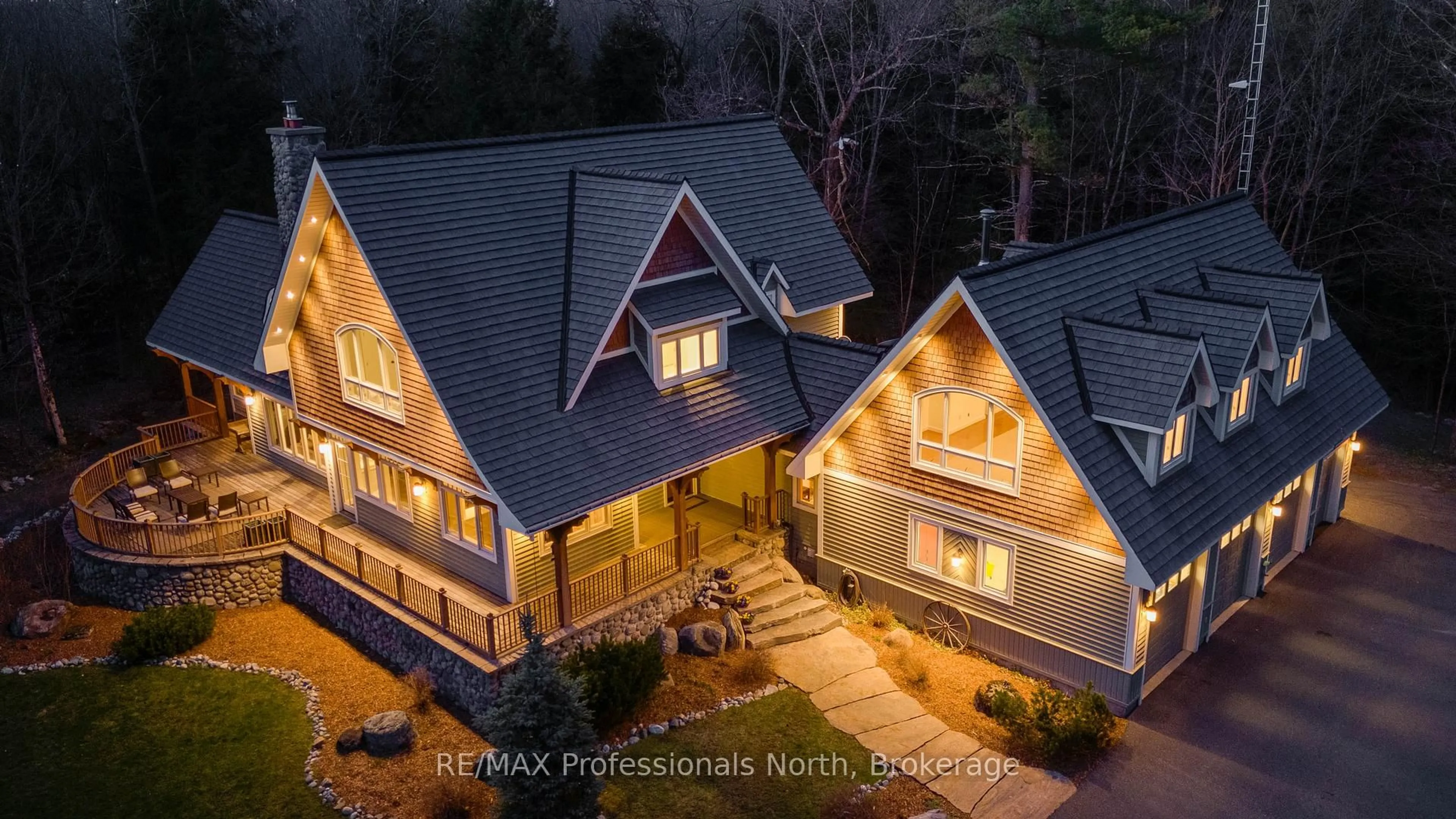 A pic from outside/outdoor area/front of a property/back of a property/a pic from drone, mountain view for 1656 MUSKOKA BEACH Rd, Bracebridge Ontario P1P 1R1