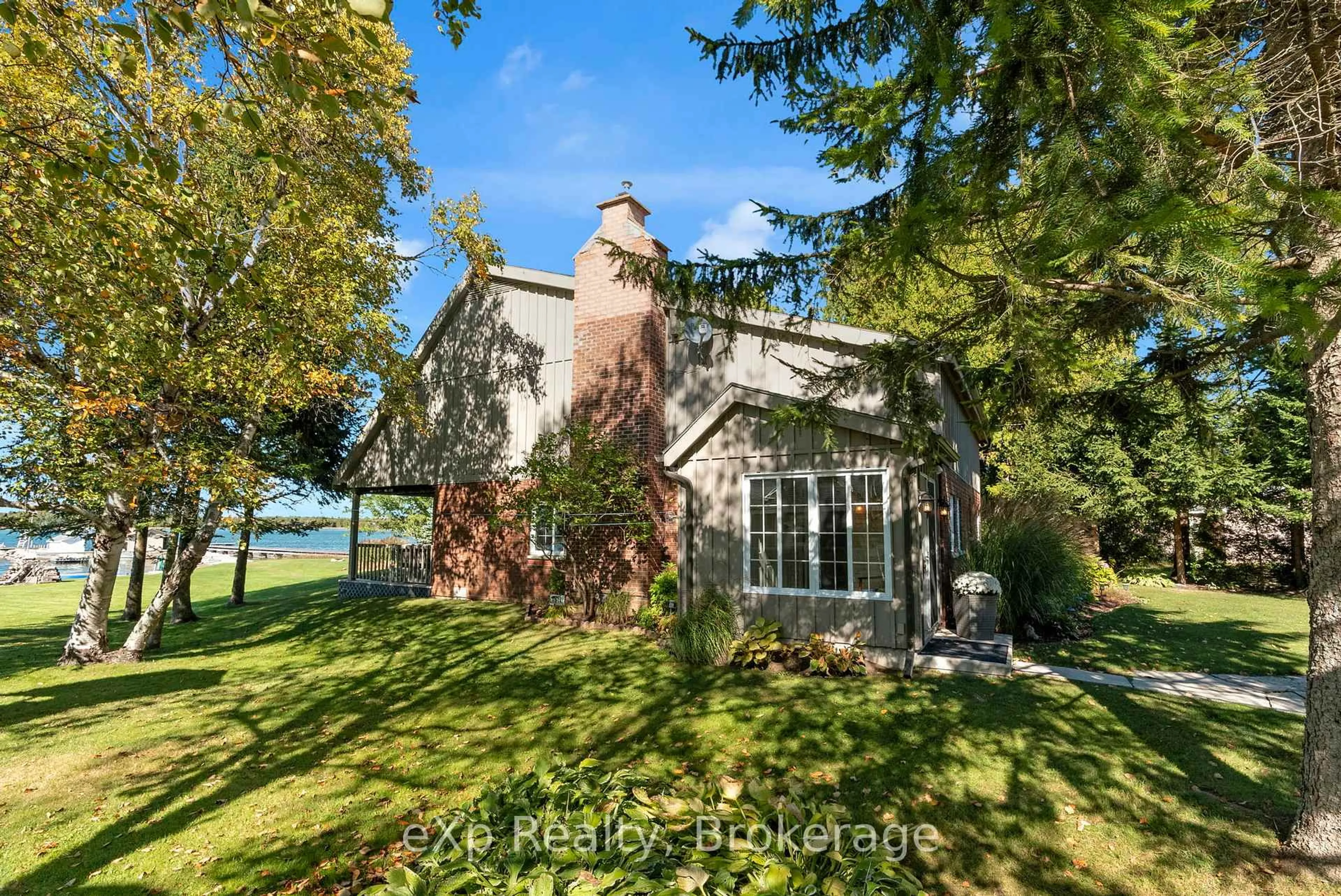 A pic from outside/outdoor area/front of a property/back of a property/a pic from drone, unknown for 850 Pike Bay Rd, Northern Bruce Peninsula Ontario N0H 2T0