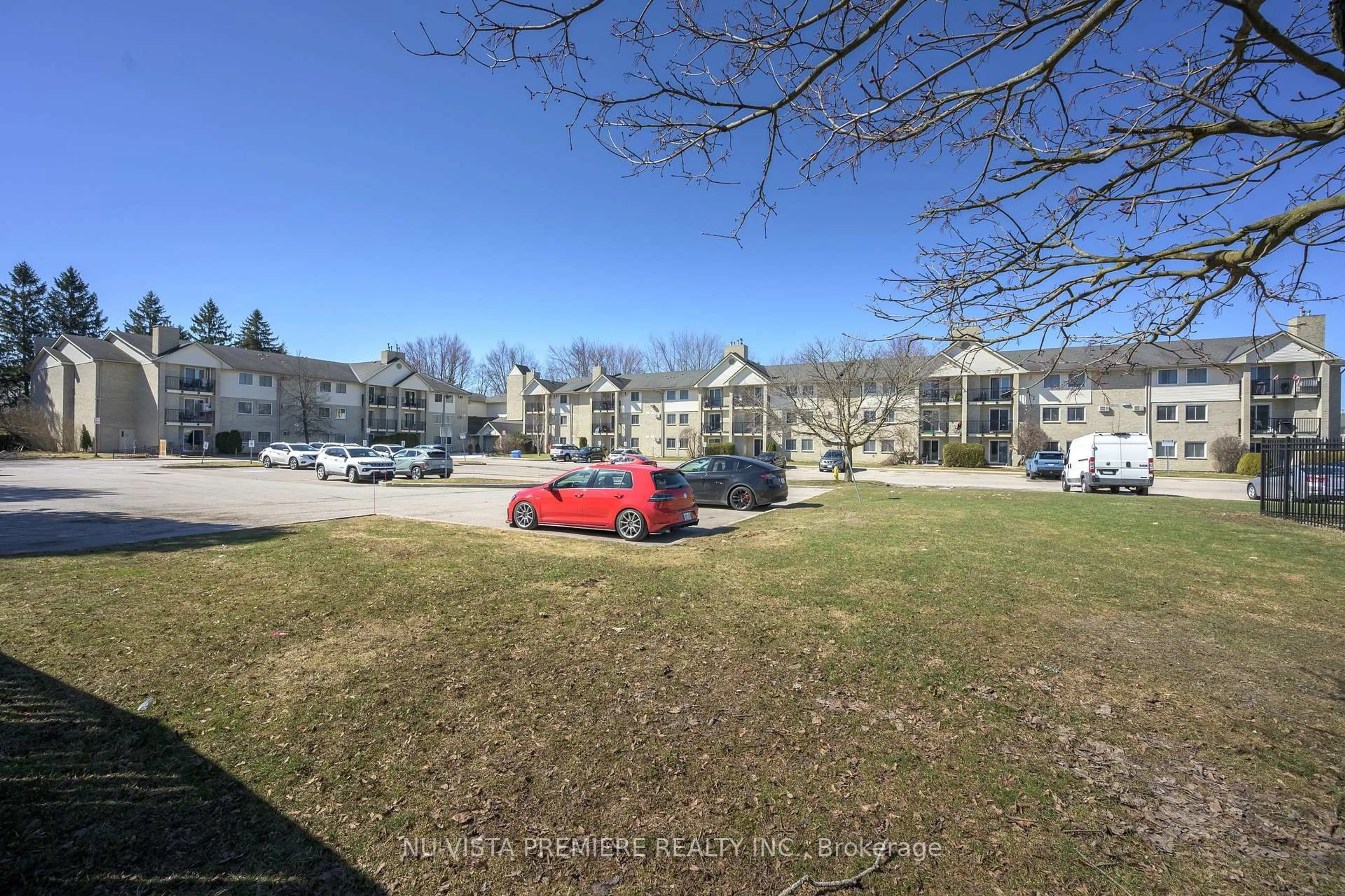 A pic from outside/outdoor area/front of a property/back of a property/a pic from drone, unknown for 725 Deveron Cres #119, London South Ontario N5Z 4X3