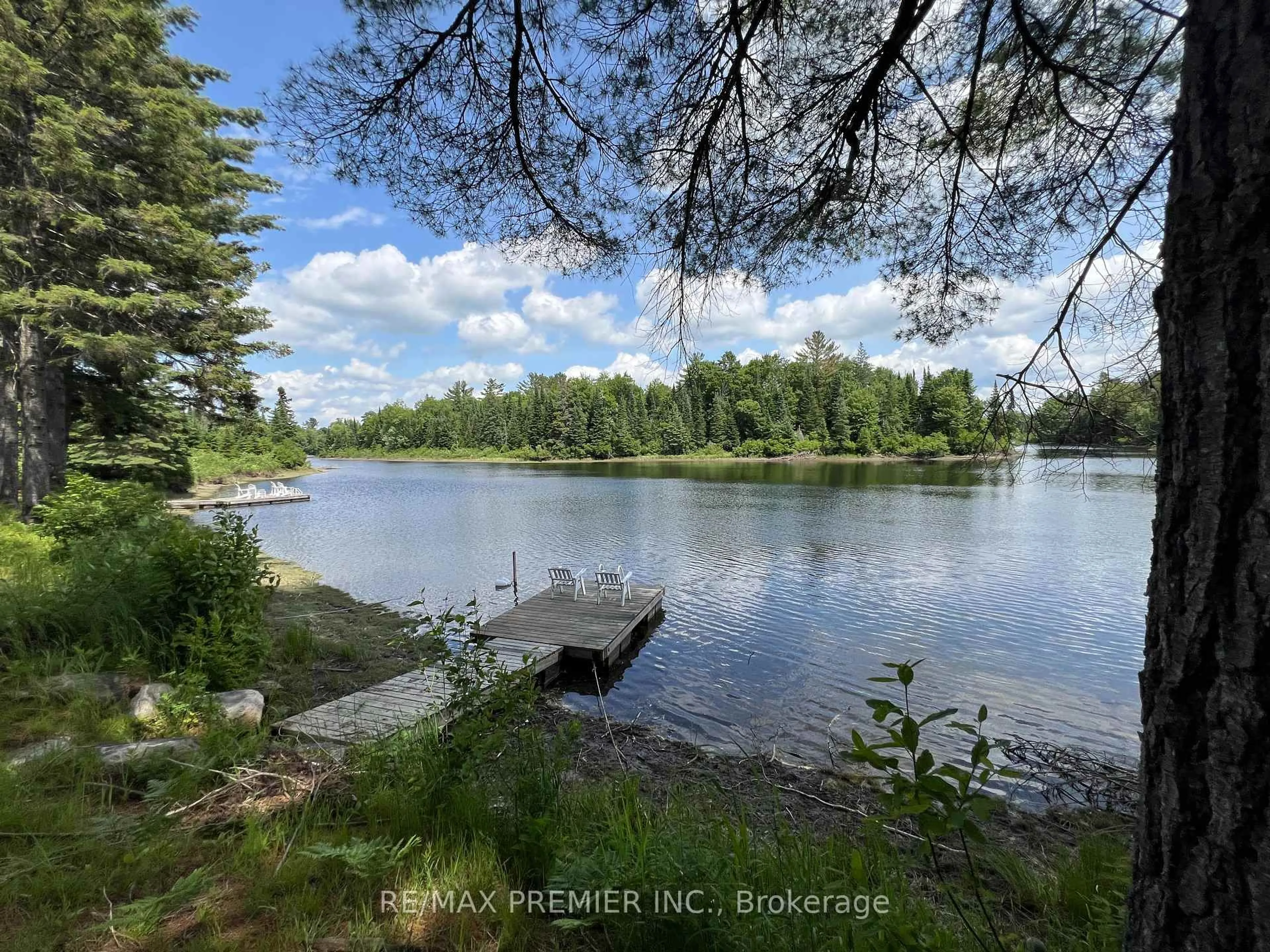A pic from outside/outdoor area/front of a property/back of a property/a pic from drone, water/lake/river/ocean view for 1130 Colony Rd, Lake of Bays Ontario P1L 1X3
