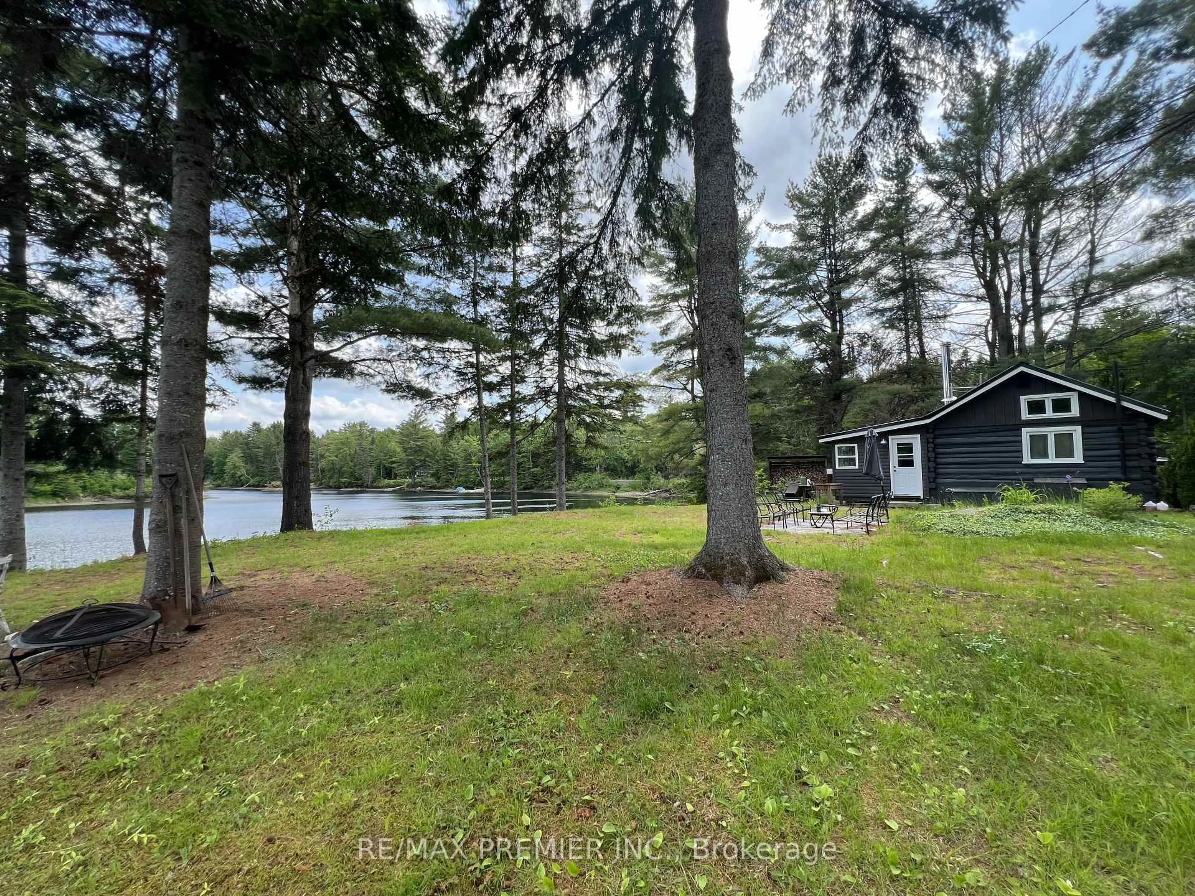 A pic from outside/outdoor area/front of a property/back of a property/a pic from drone, water/lake/river/ocean view for 1130 Colony Rd, Lake of Bays Ontario P1L 1X3