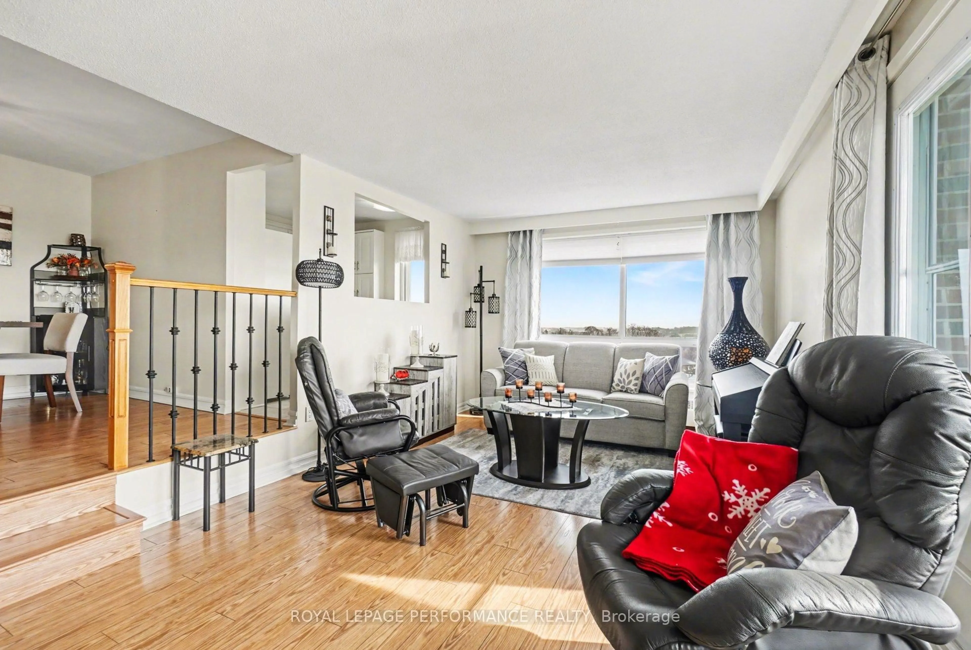 Living room with furniture, unknown for 915 Elmsmere Rd #715, Ottawa Ontario K1J 8H8