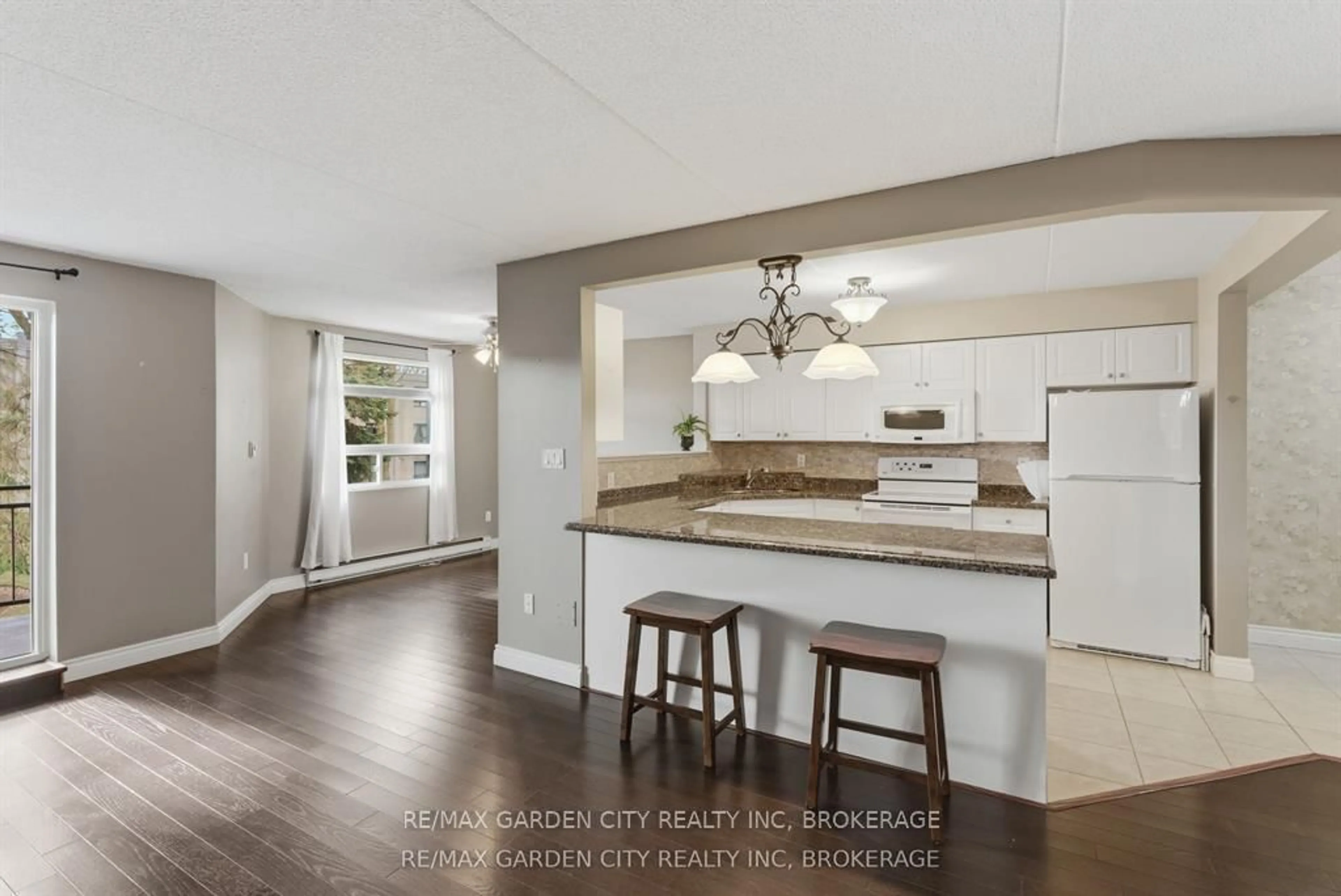 Open concept kitchen, unknown for 4658 Drummond Rd #230, Niagara Falls Ontario L2E 7E1