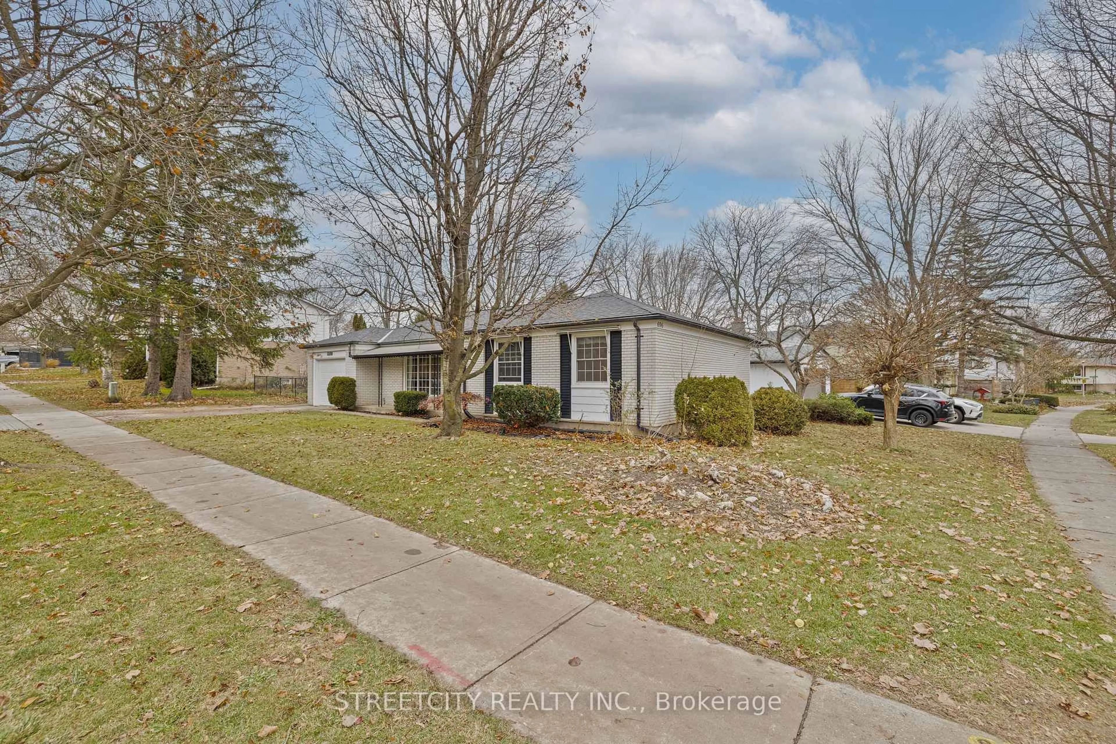 A pic from outside/outdoor area/front of a property/back of a property/a pic from drone, street for 696 Village Green Ave, London South Ontario N6K 1H1