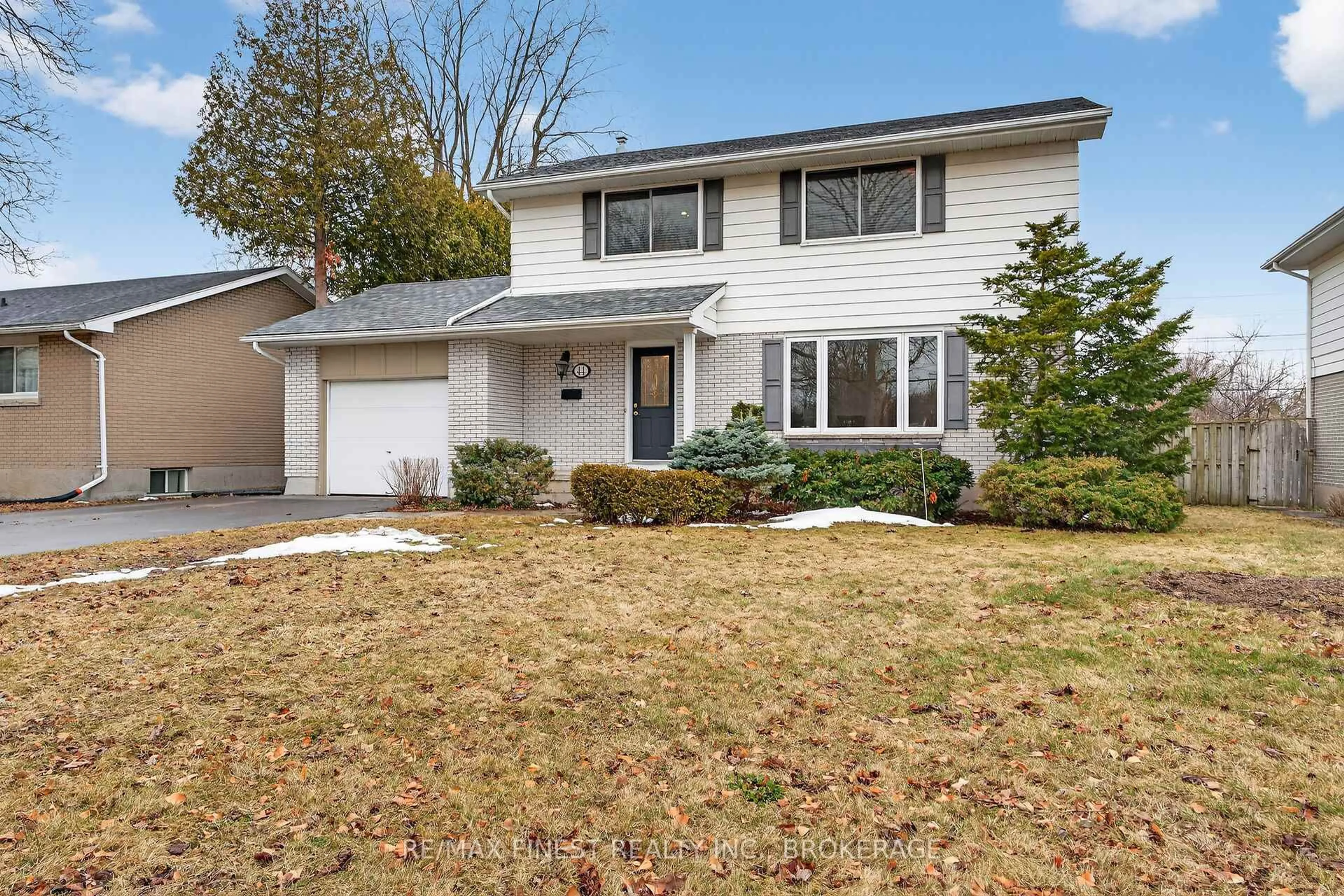 Home with vinyl exterior material, street for 44 Casterton Ave, Kingston Ontario K7M 1R5