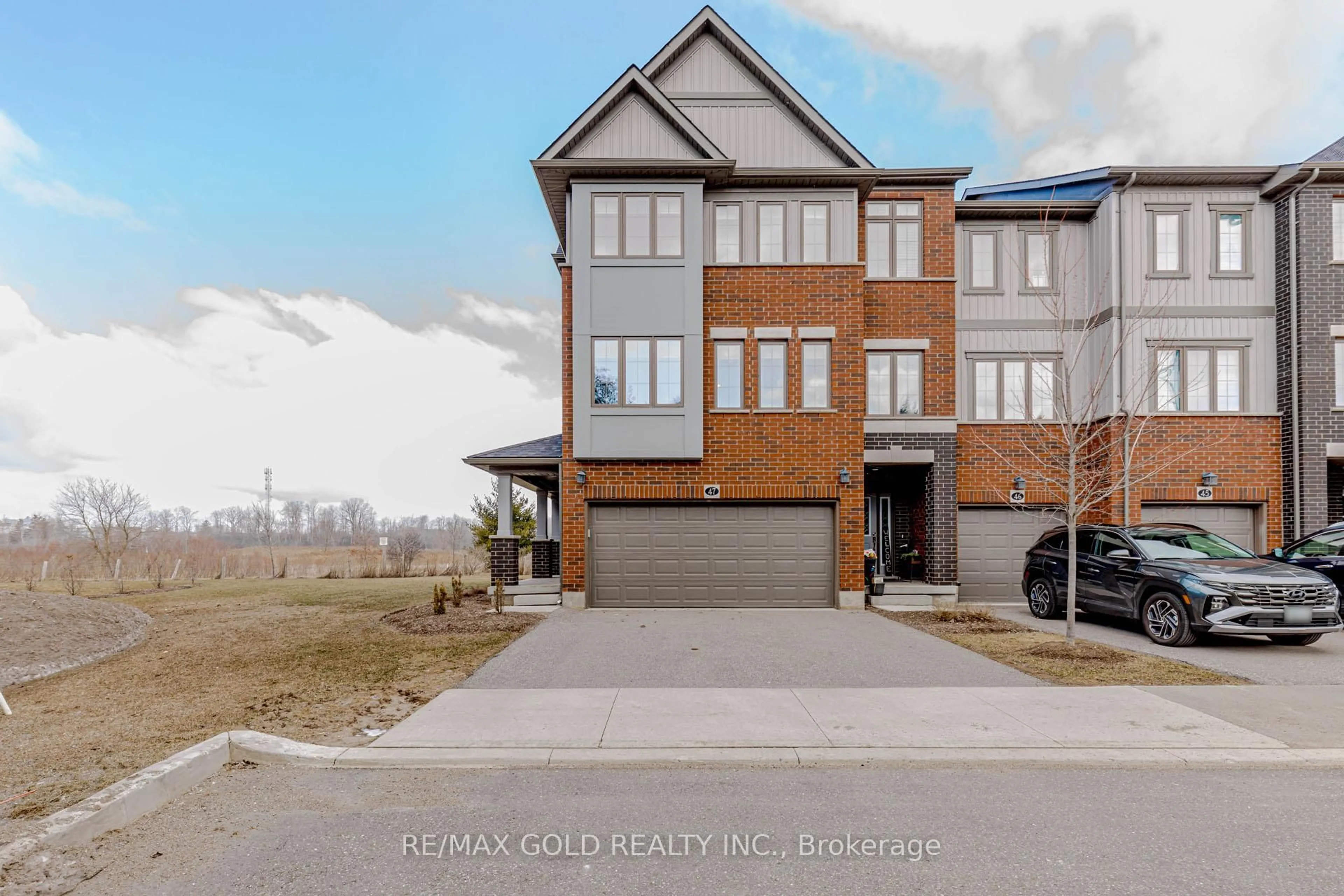 Home with brick exterior material, street for 311 Woolwich St #47, Waterloo Ontario N2K 0H4