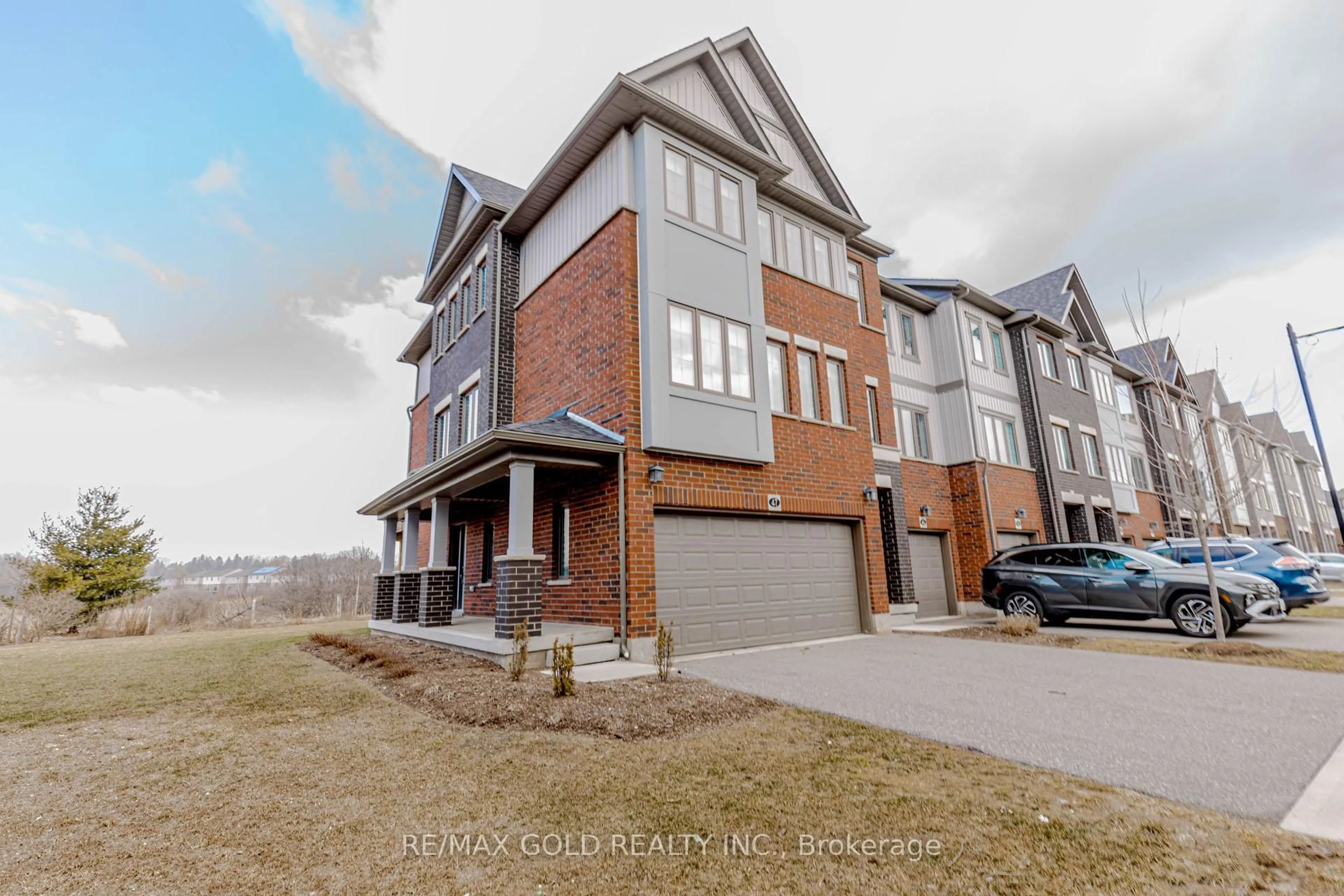 Home with brick exterior material, street for 311 Woolwich St #47, Waterloo Ontario N2K 0H4