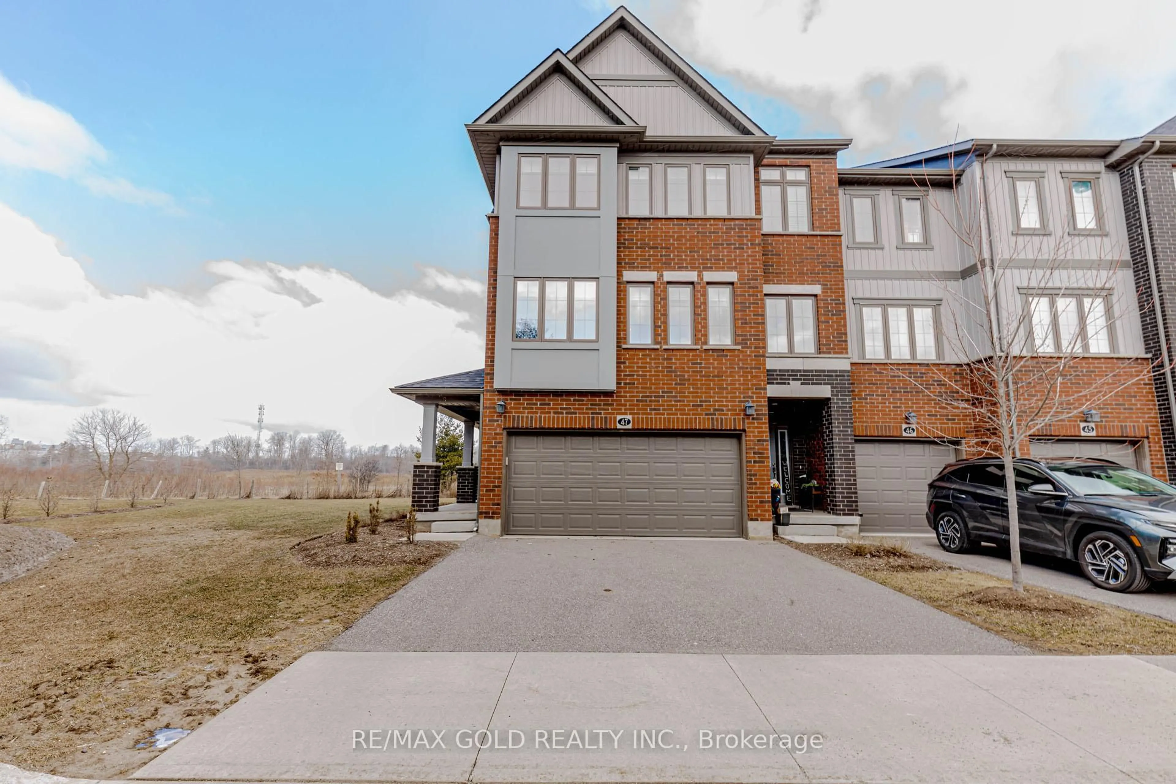 Home with brick exterior material, street for 311 Woolwich St #47, Waterloo Ontario N2K 0H4