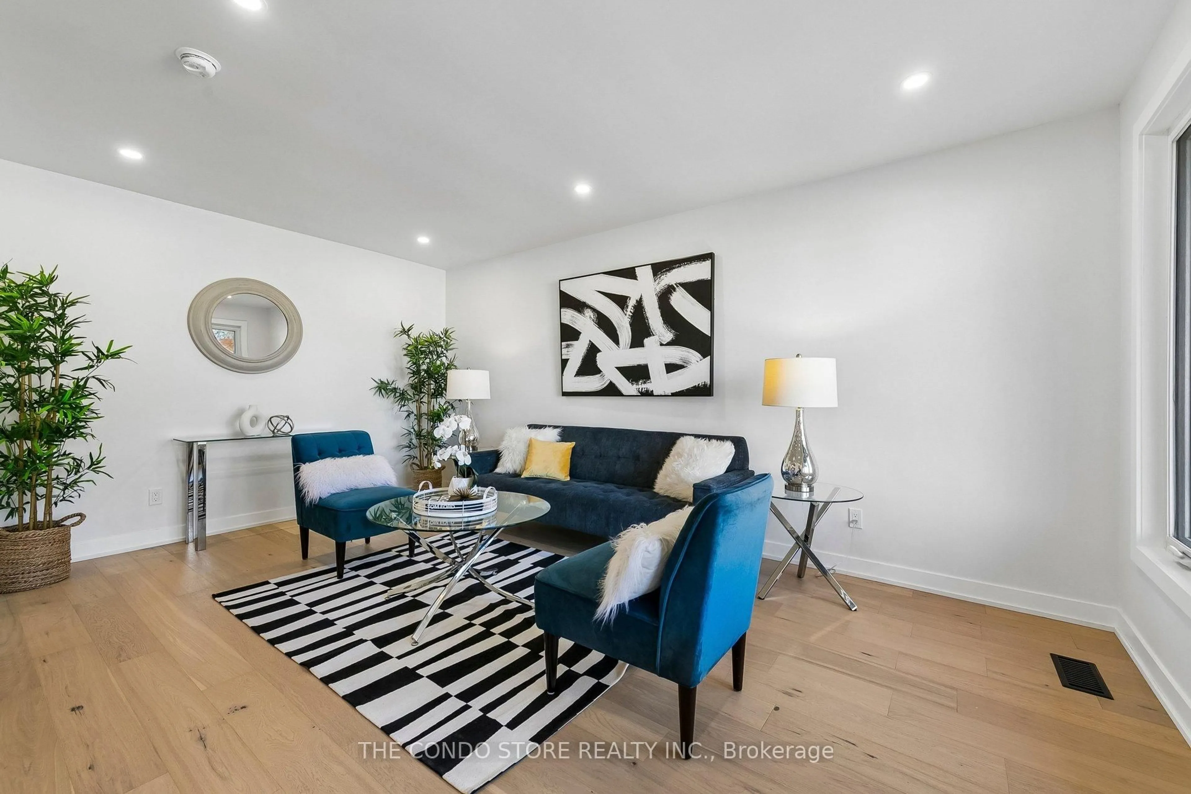 Living room with furniture, wood/laminate floor for 15 Colonial Crt, Hamilton Ontario L8K 4H2