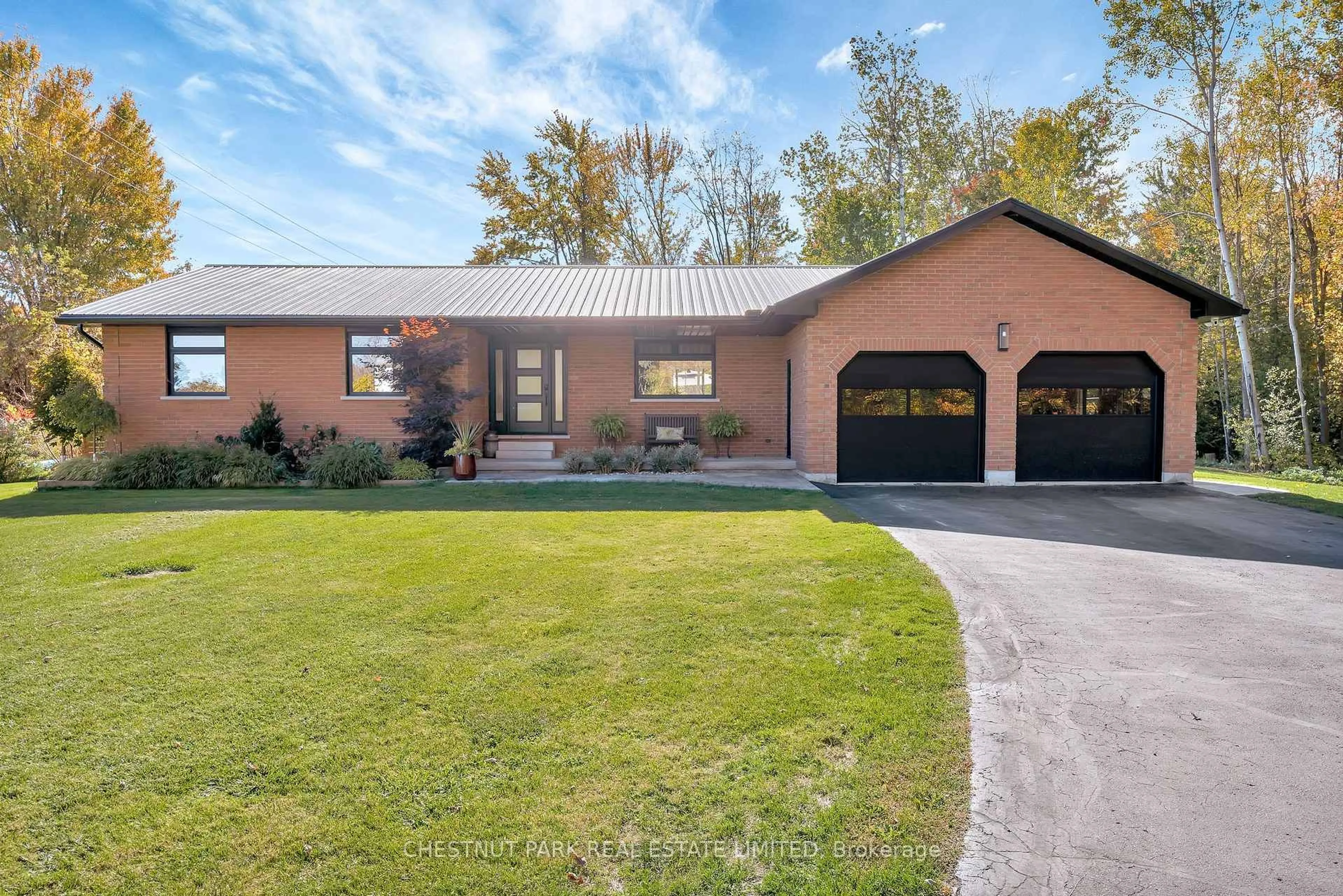 Home with brick exterior material, street for 407 County Road 4, Prince Edward County Ontario K0K 2T0